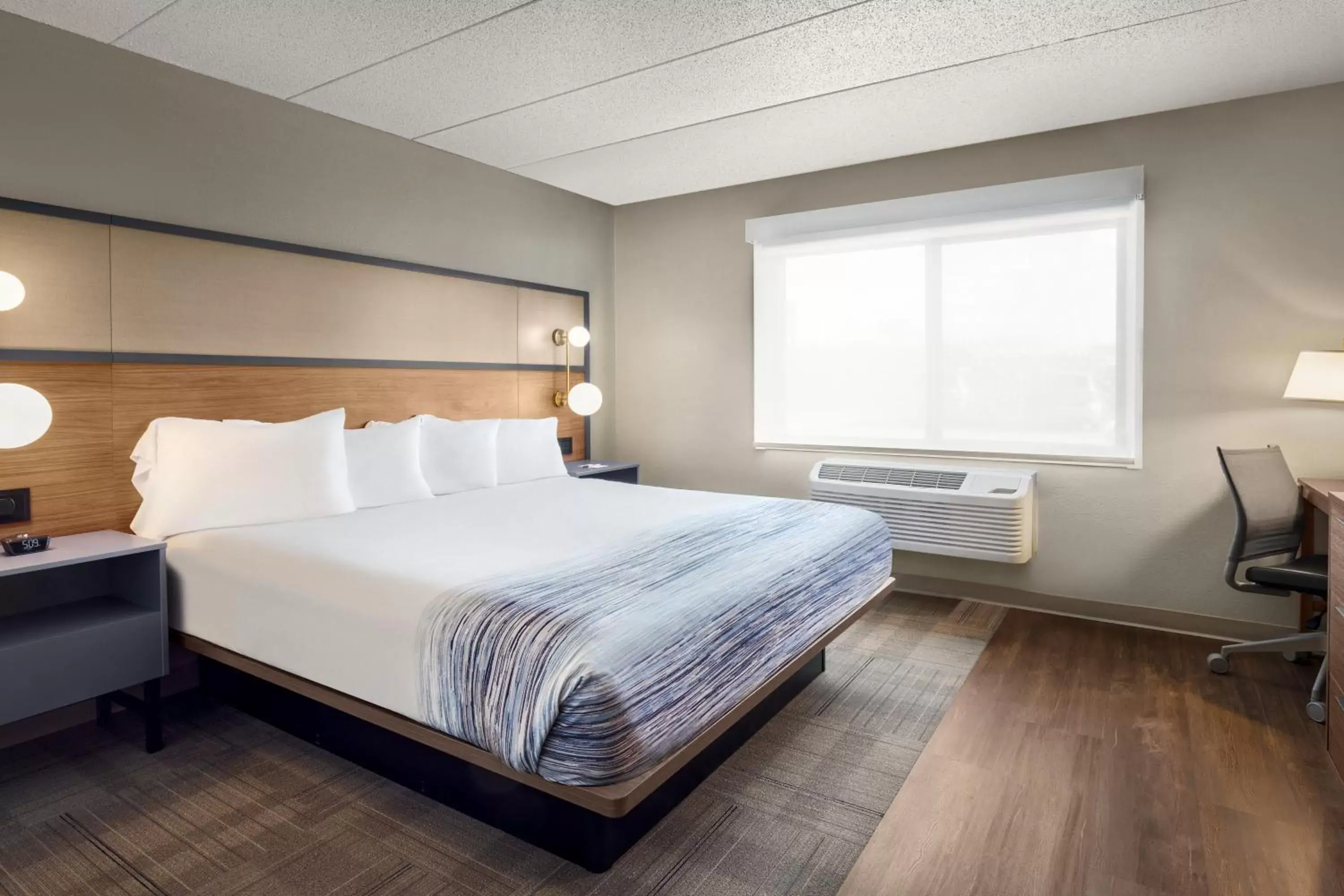 Bedroom, Bed in AmericInn by Wyndham Rapid City