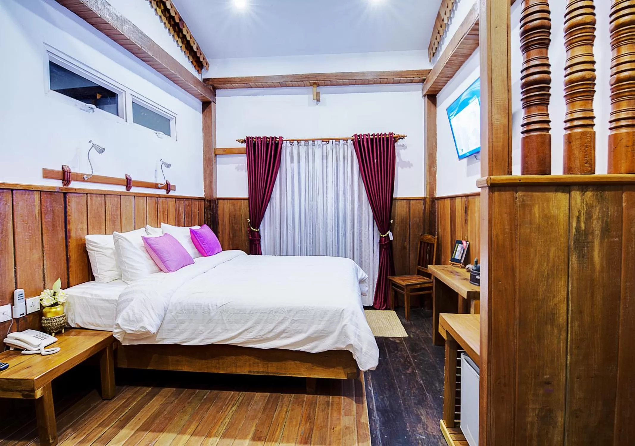 Bed in Maison Model d'Angkor