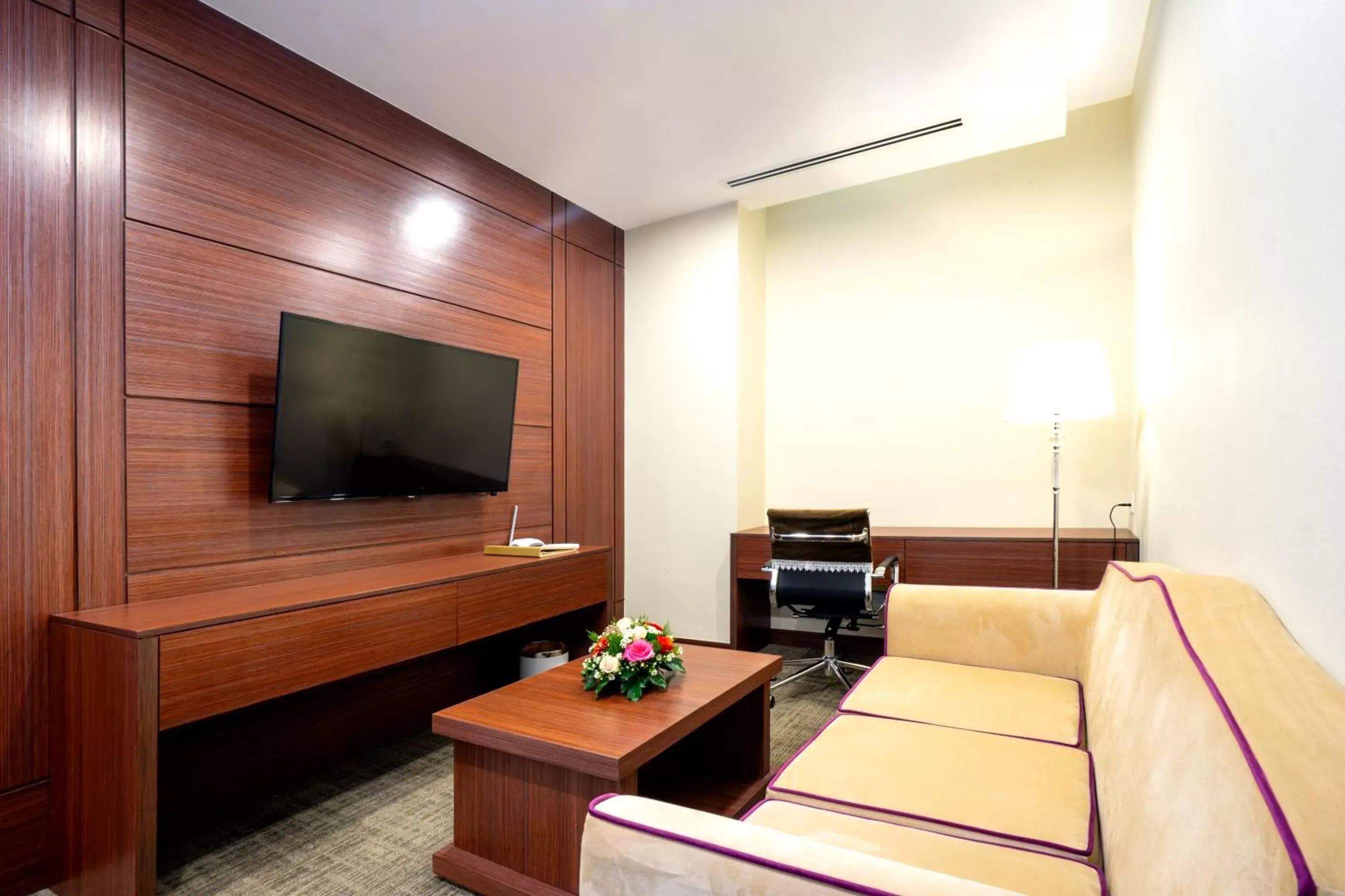 Living room, TV/Entertainment Center in Becamex Hotel New City