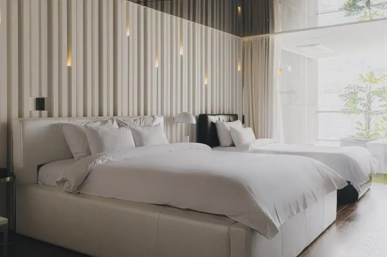 Bed in ACC Design Hotel