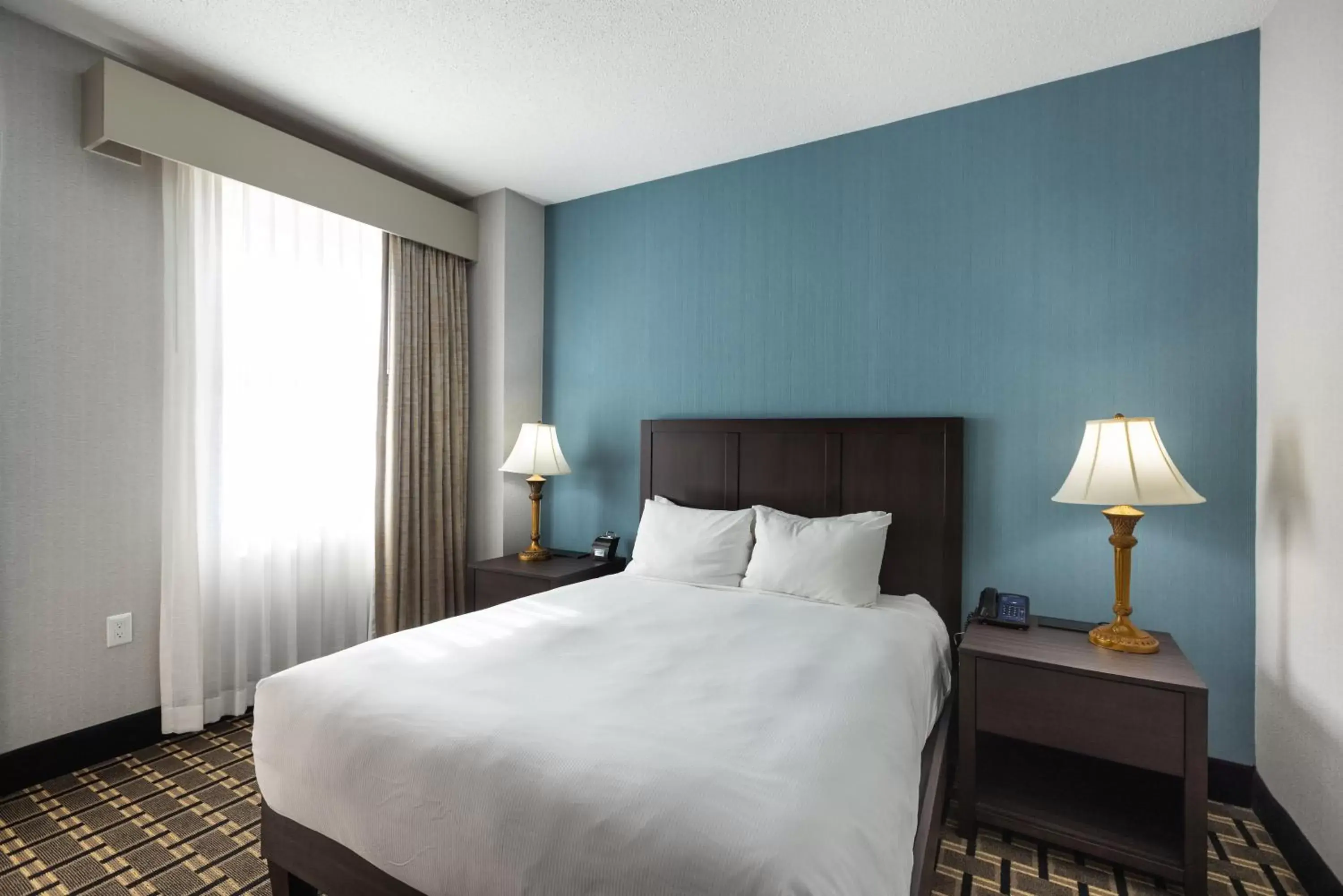 Guests, Bed in Inn at the Colonnade Baltimore - A DoubleTree by Hilton Hotel