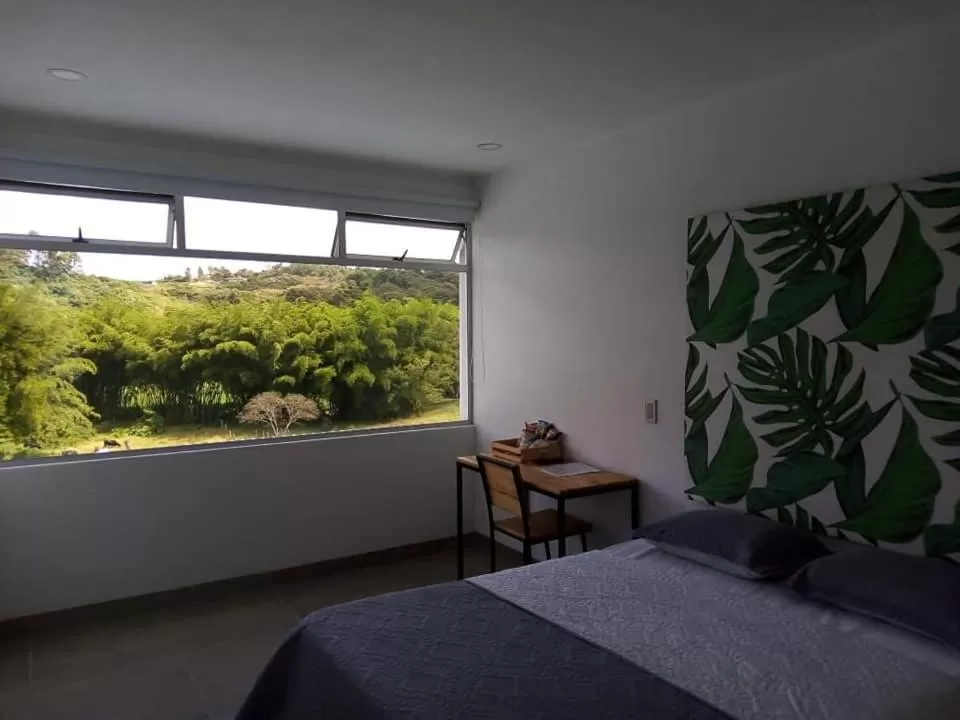 Bed in Hotel La Aldea del Oriente