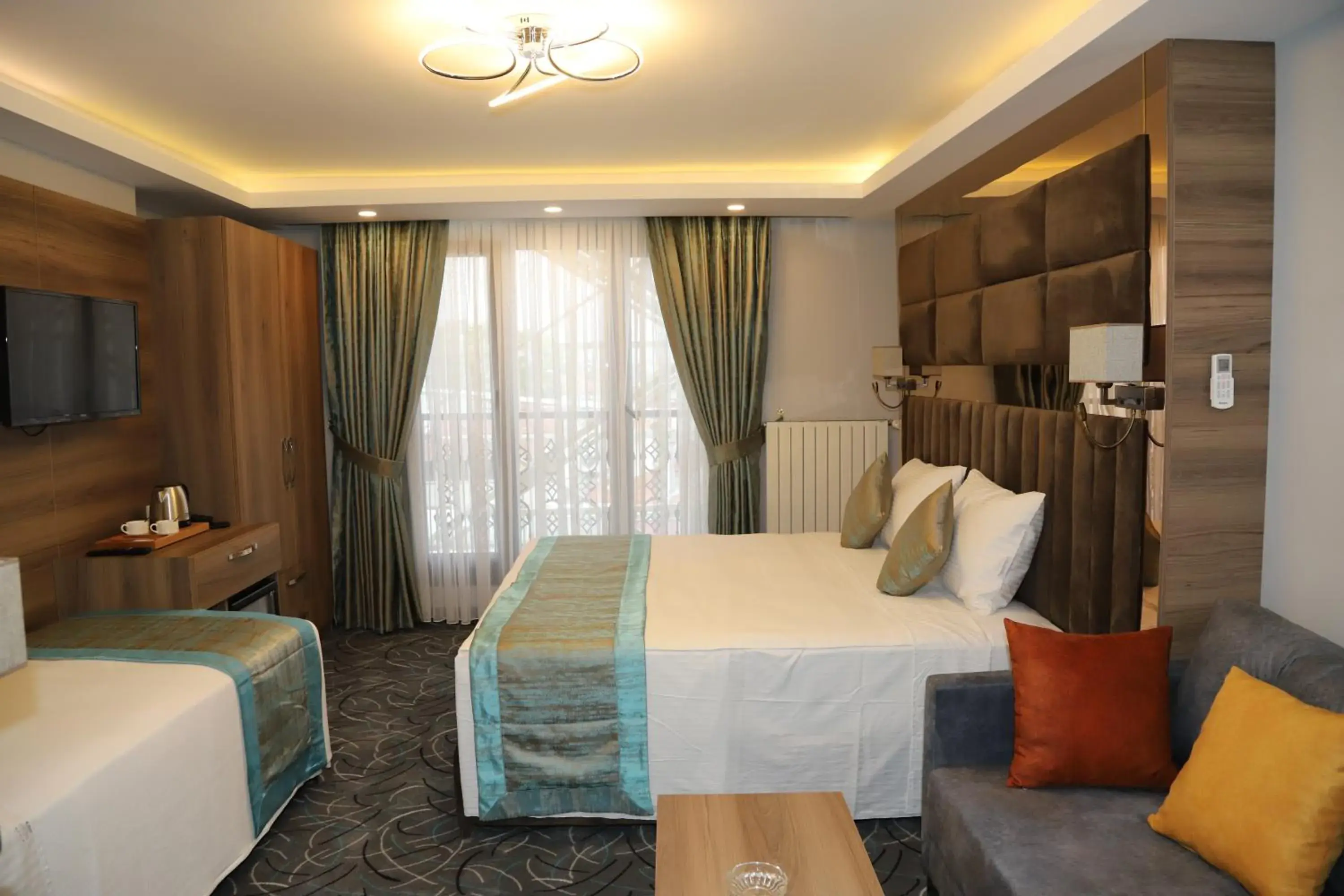 Bed in Grand Kavi Hotel Bed in Grand Kavi Hotel