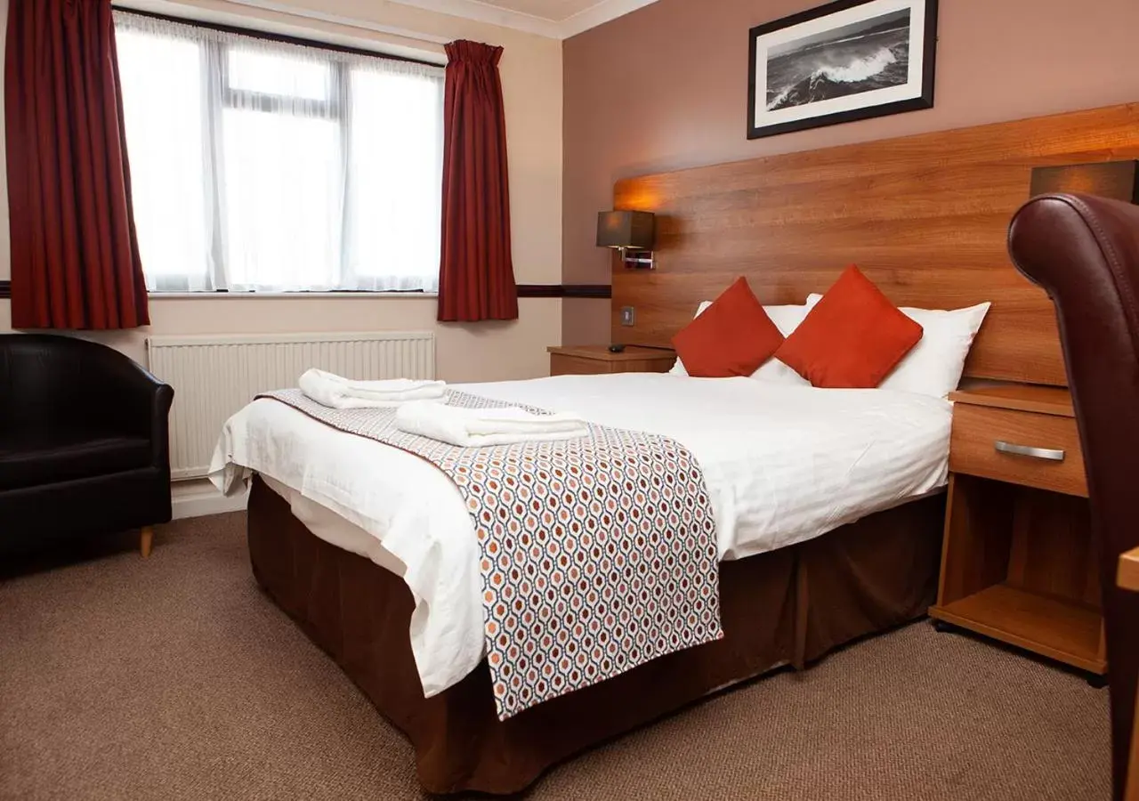 Photo of the whole room, Bed in Griffin Inn