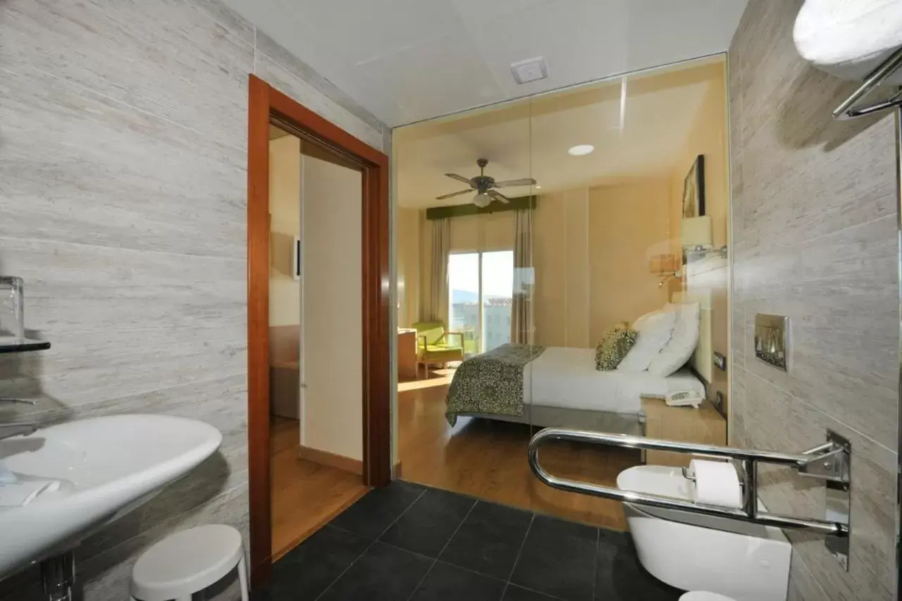 Bedroom, Bathroom in Hotel Salobreña Suites