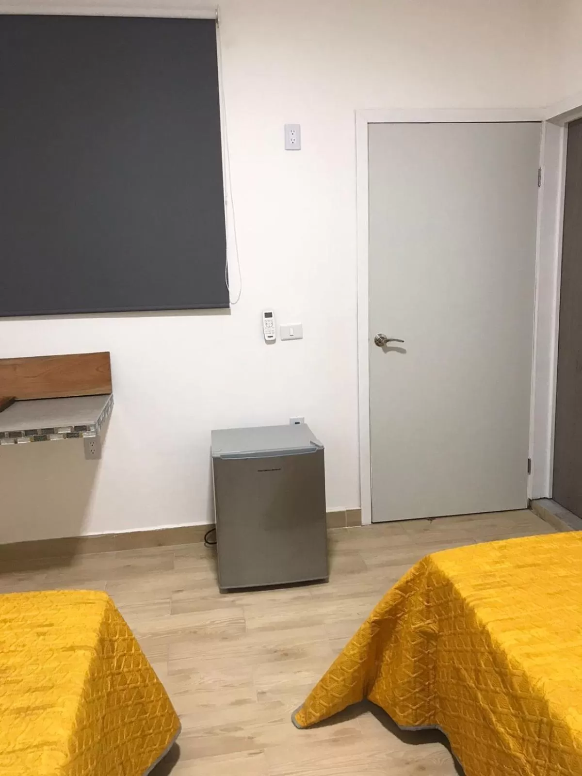 Photo of the whole room, Bed in Garden Suites Comalcalco