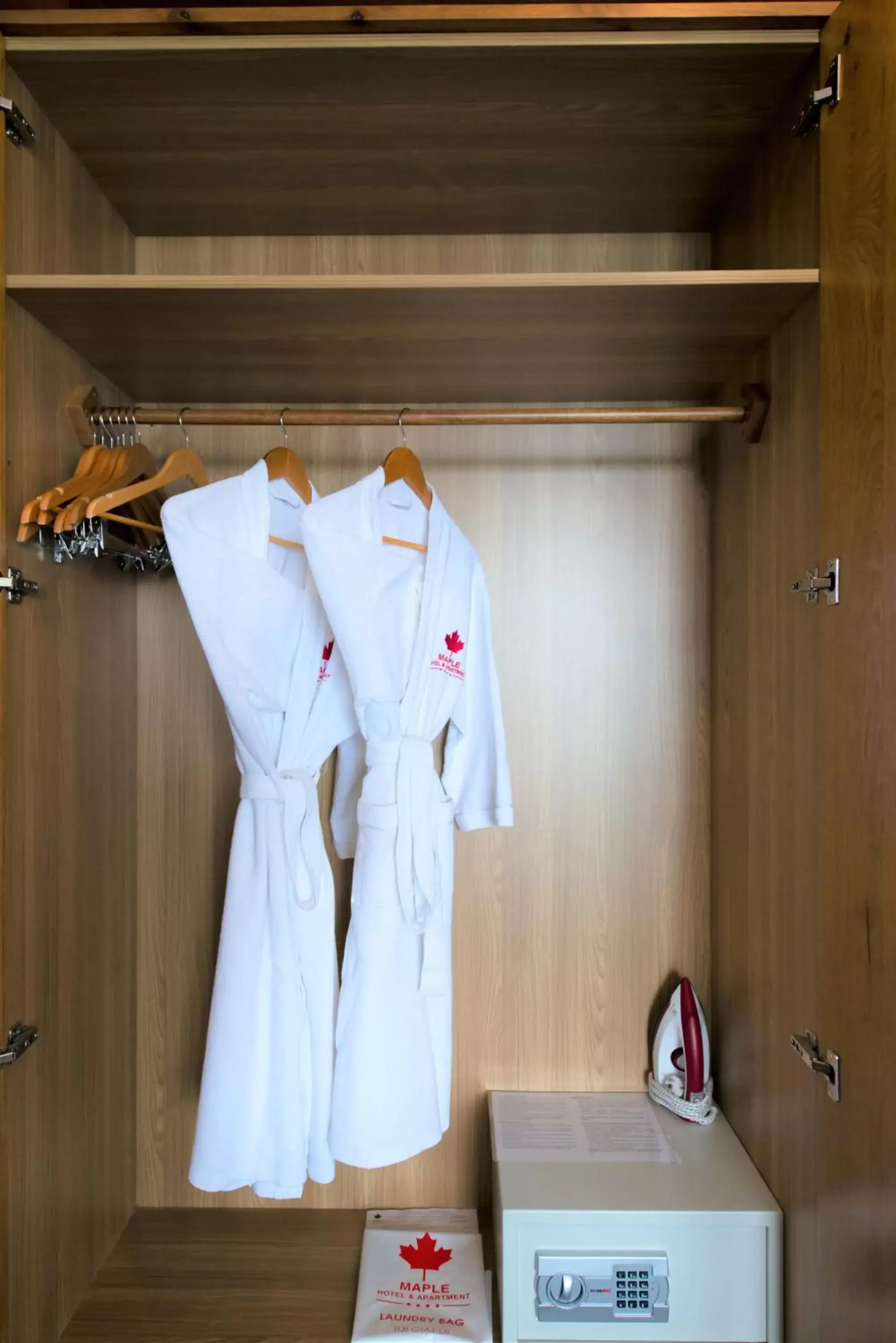 wardrobe, Bed in Maple Hotel & Apartment