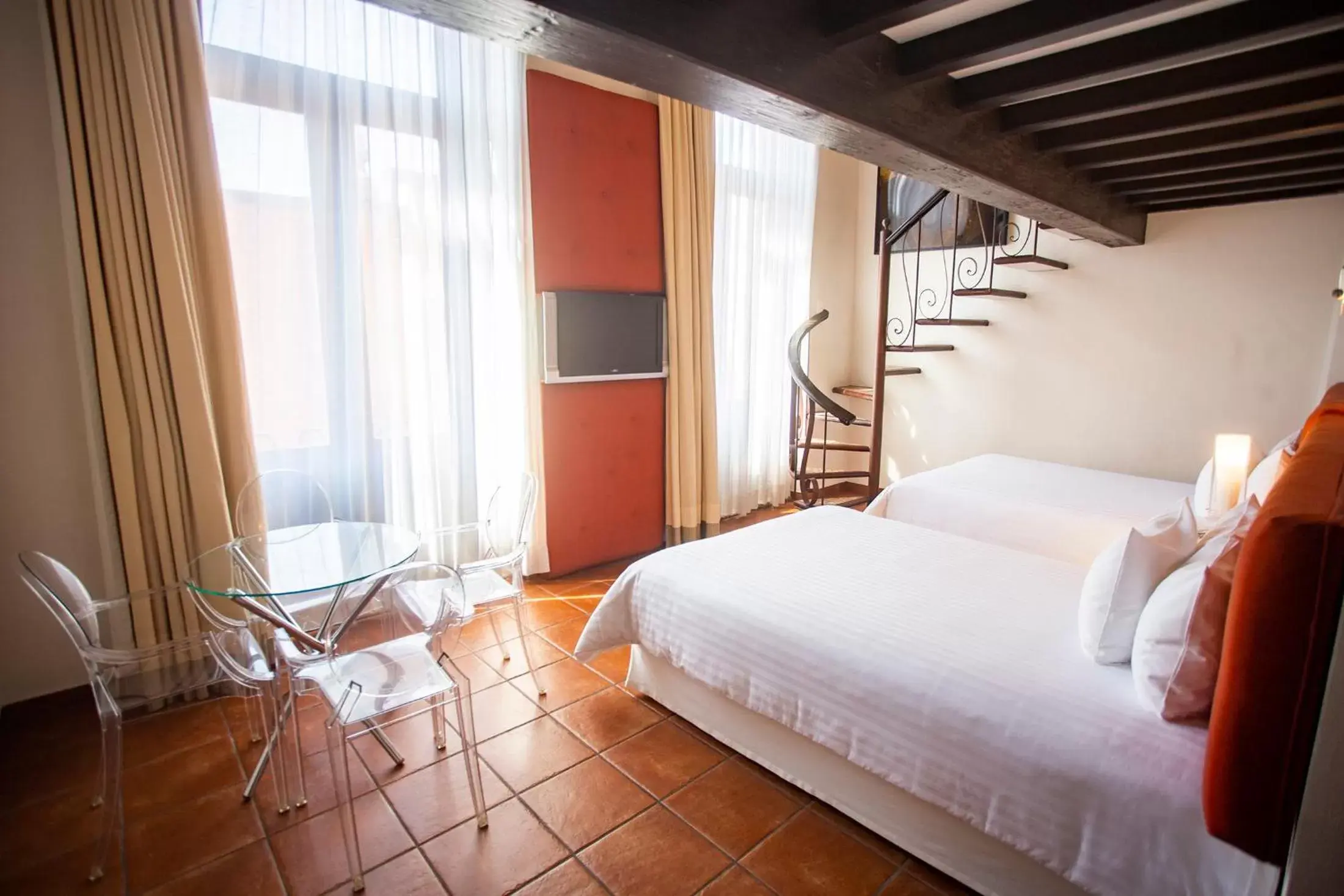 Bed in Hotel Herencia By Hosting House