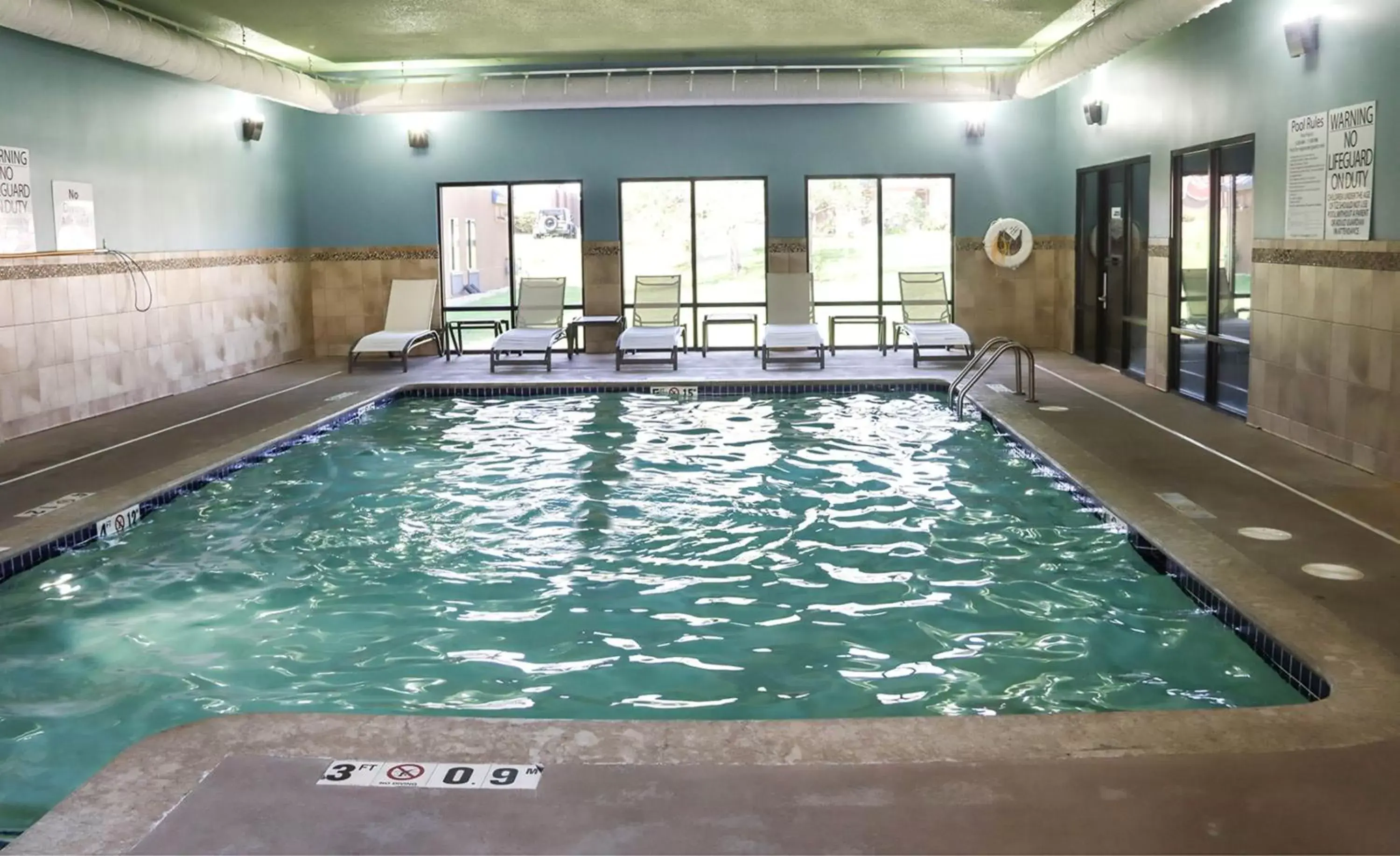 Swimming Pool in Holiday Inn Express Cedar Rapids - Collins Road, an IHG Hotel