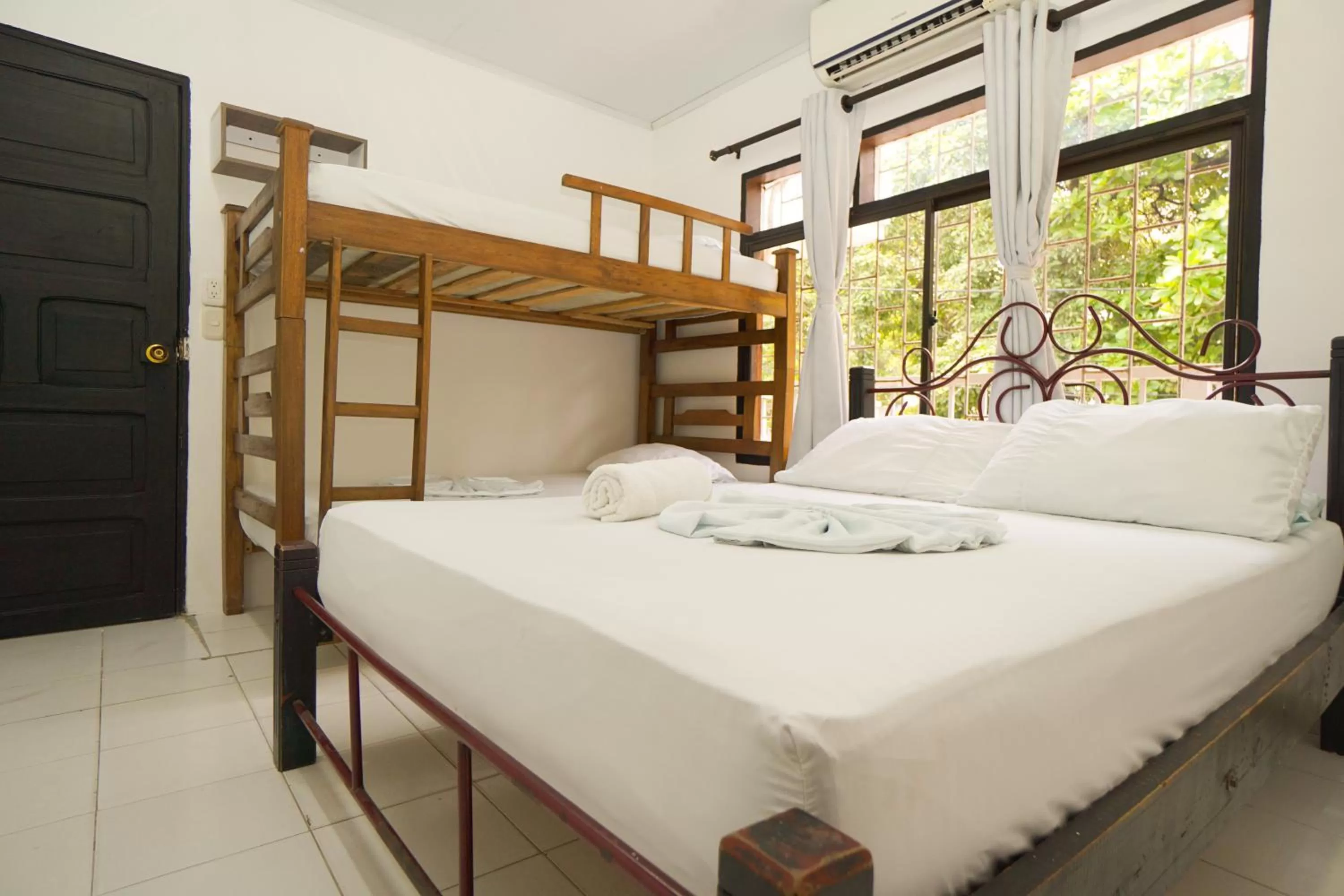 Bed in Hostal Paraiso Tayrona