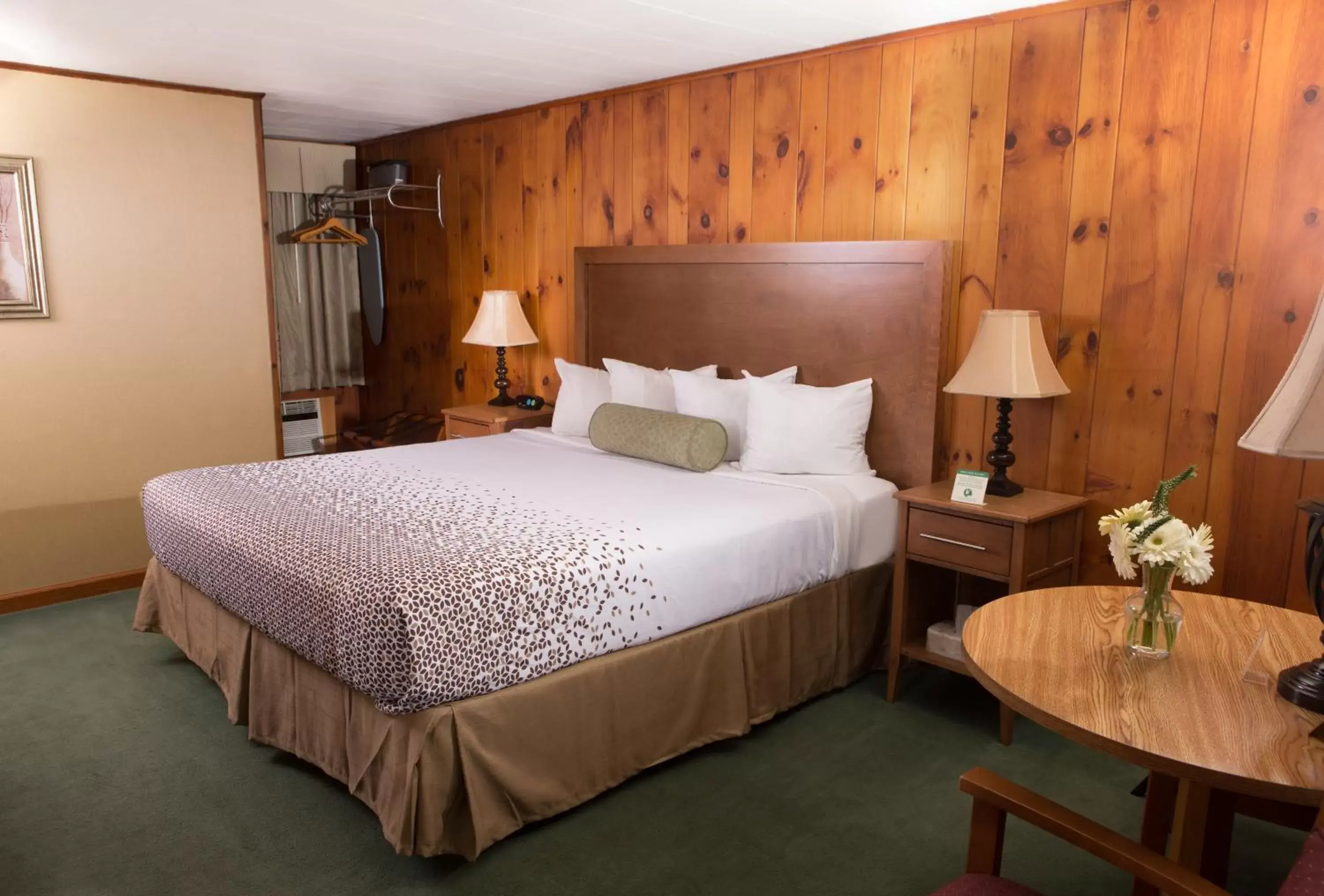 Bed in Knotty Pine Motel