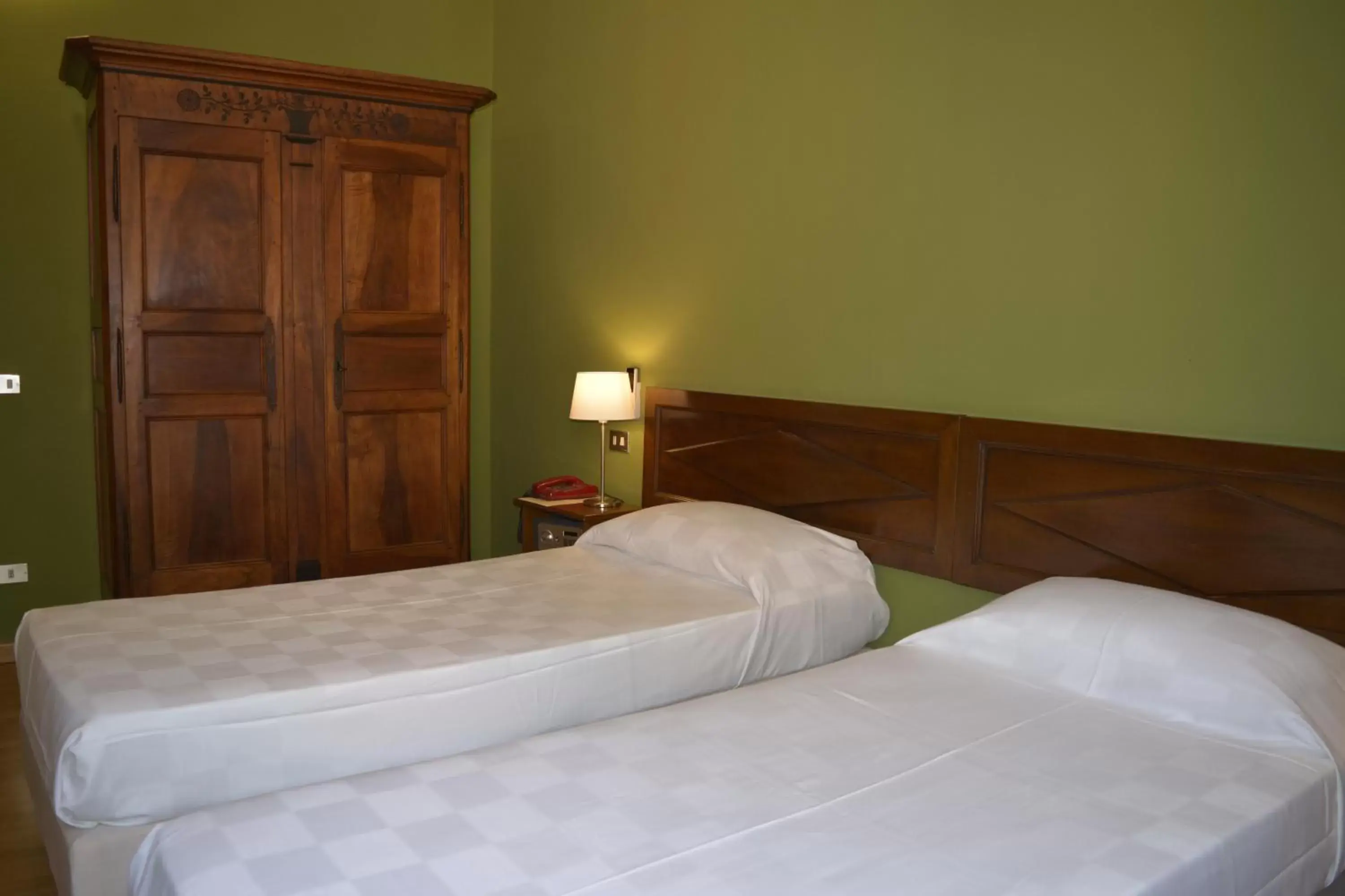 Bed in Albergo Bologna