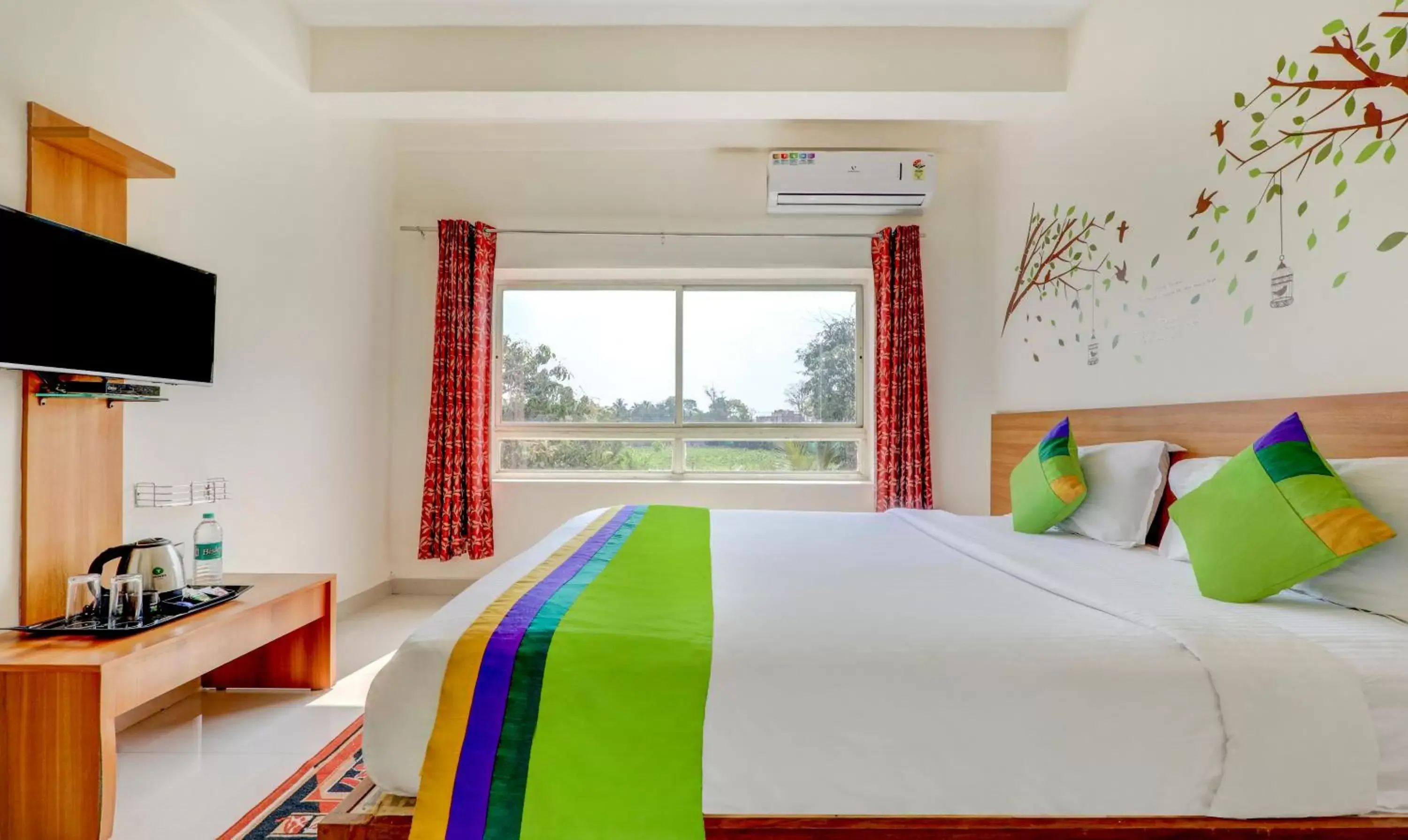 Bedroom, Bed in Treebo Atithi Comforts, 1 Km From Nisargadhama Forest Bedroom, Bed in Treebo Atithi Comforts, 1 Km From Nisargadhama Forest