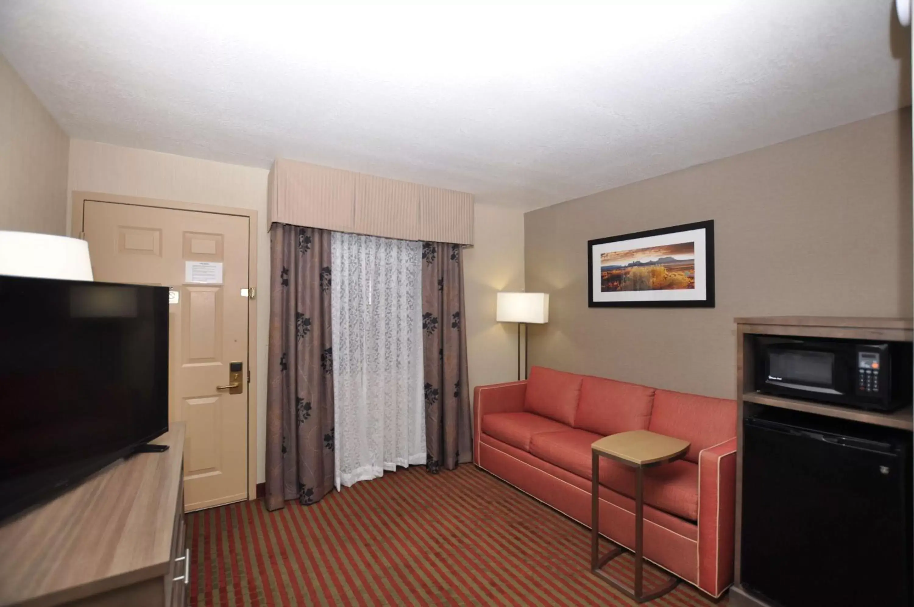 TV and multimedia, TV/Entertainment Center in Best Western Plus Executive Suites Albuquerque