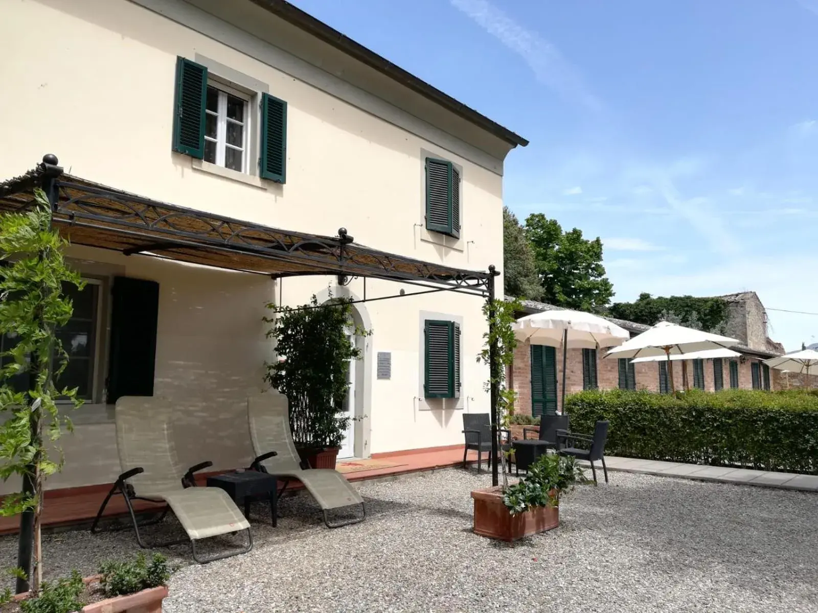 Patio, Property Building in Cortona Resort & Spa - Villa Aurea