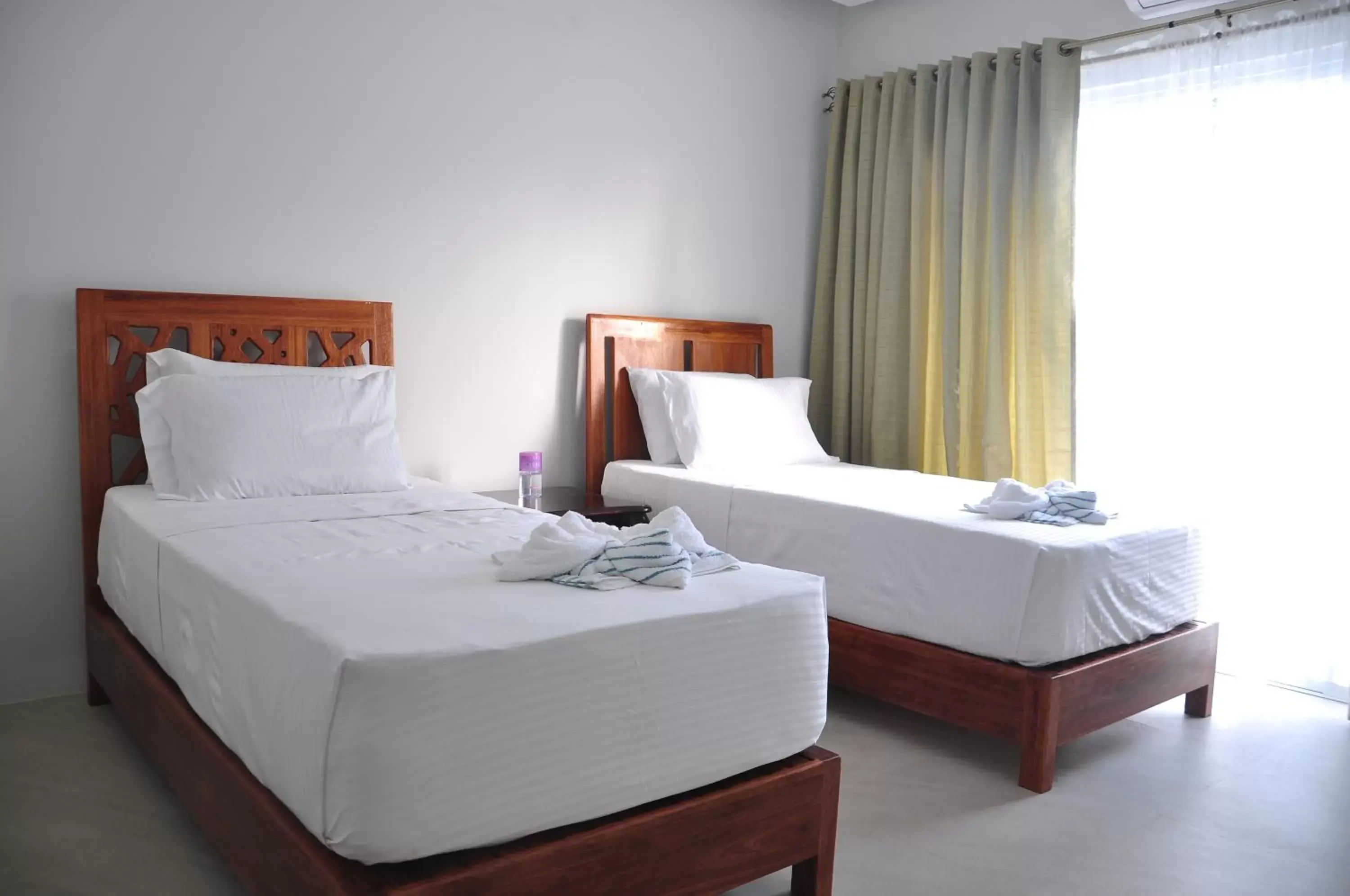 Deluxe Triple Room in Greenspace Palawan