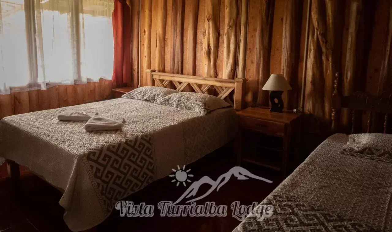 Bed in Vista Turrialba Lodge