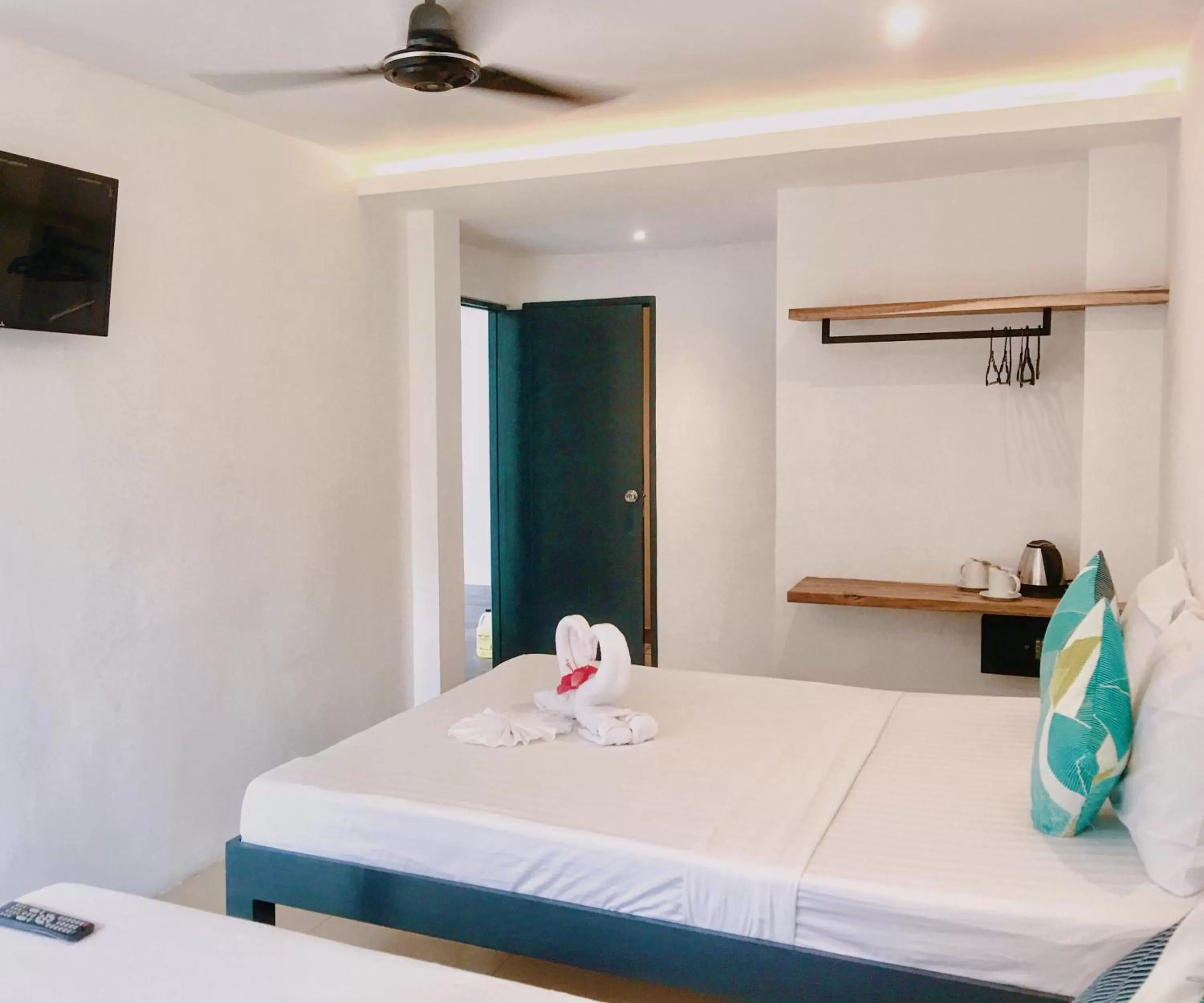 Bed in Palmera El Nido Inn