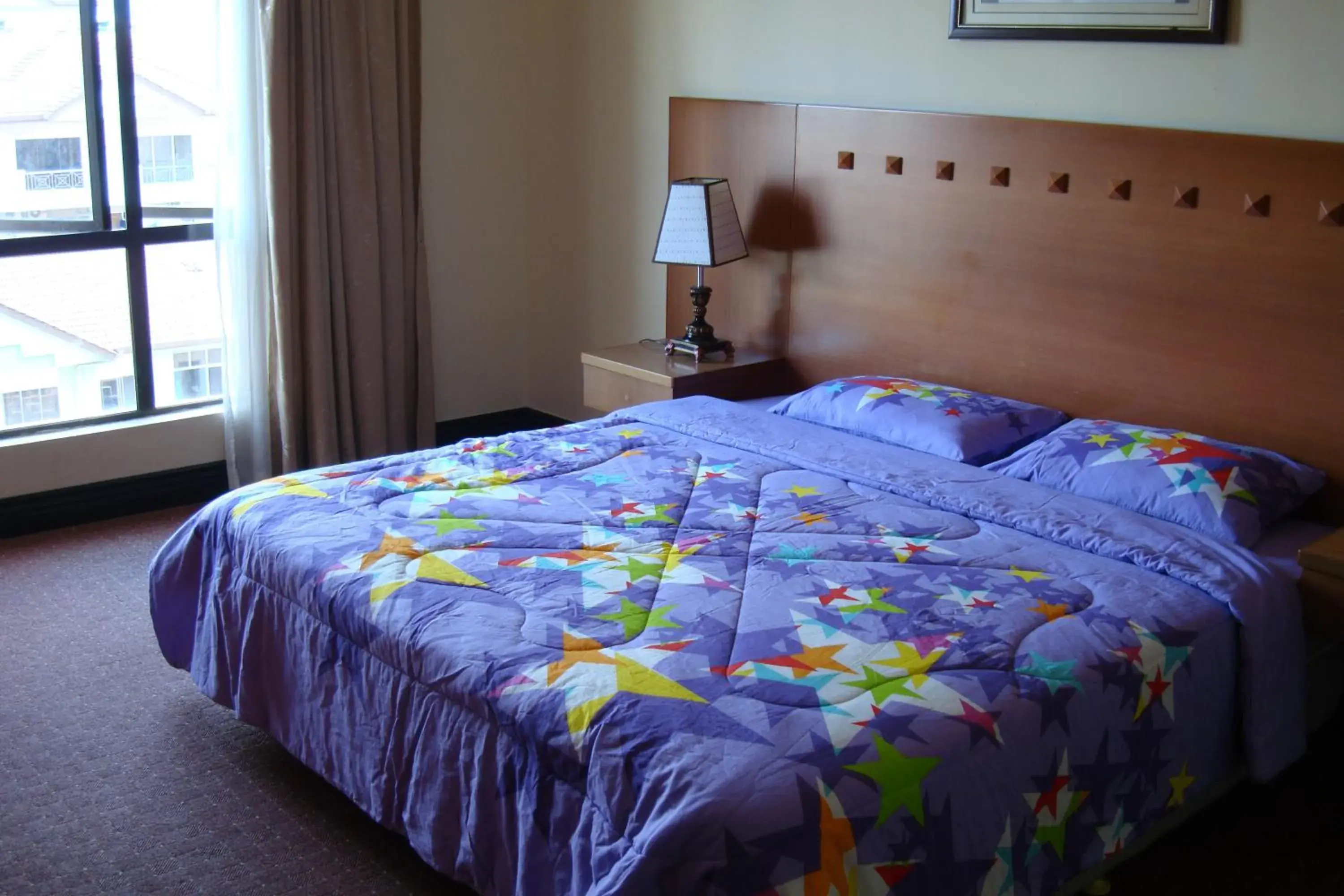 Photo of the whole room, Bed in Dorcas Service Apartment - Marina Court