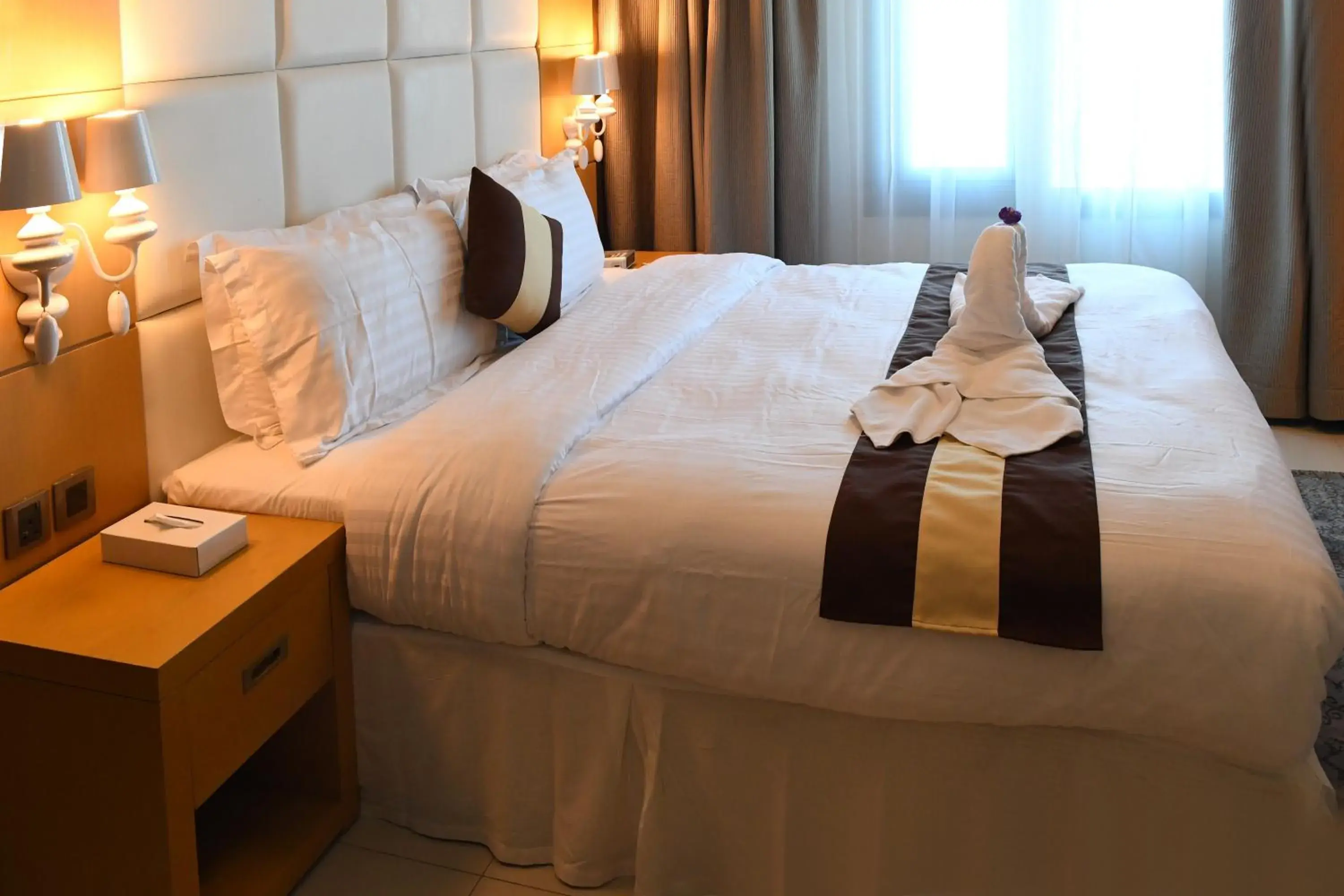 Bed in Al Olaya Suites Hotel