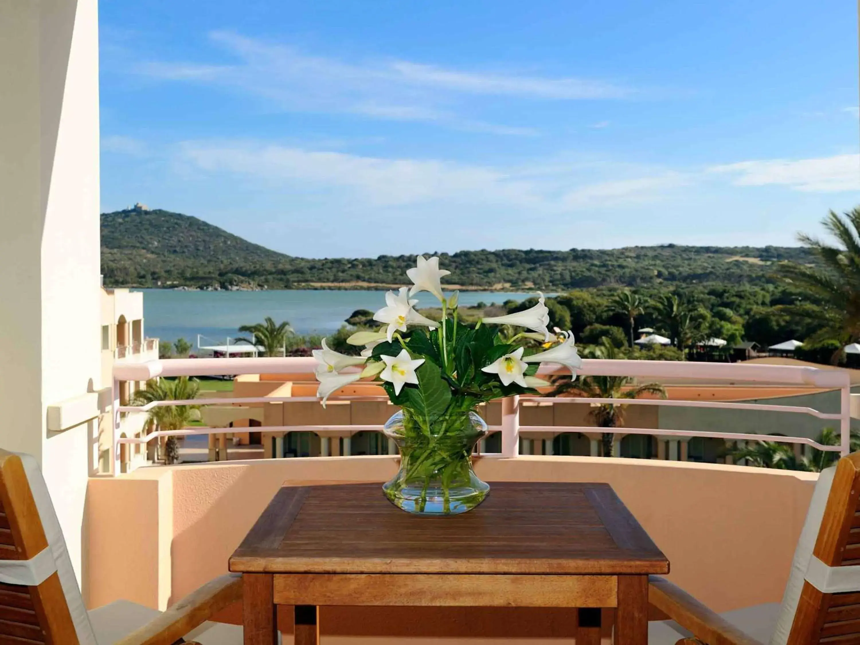 Bedroom, Balcony/Terrace in Pullman Timi Ama Sardegna