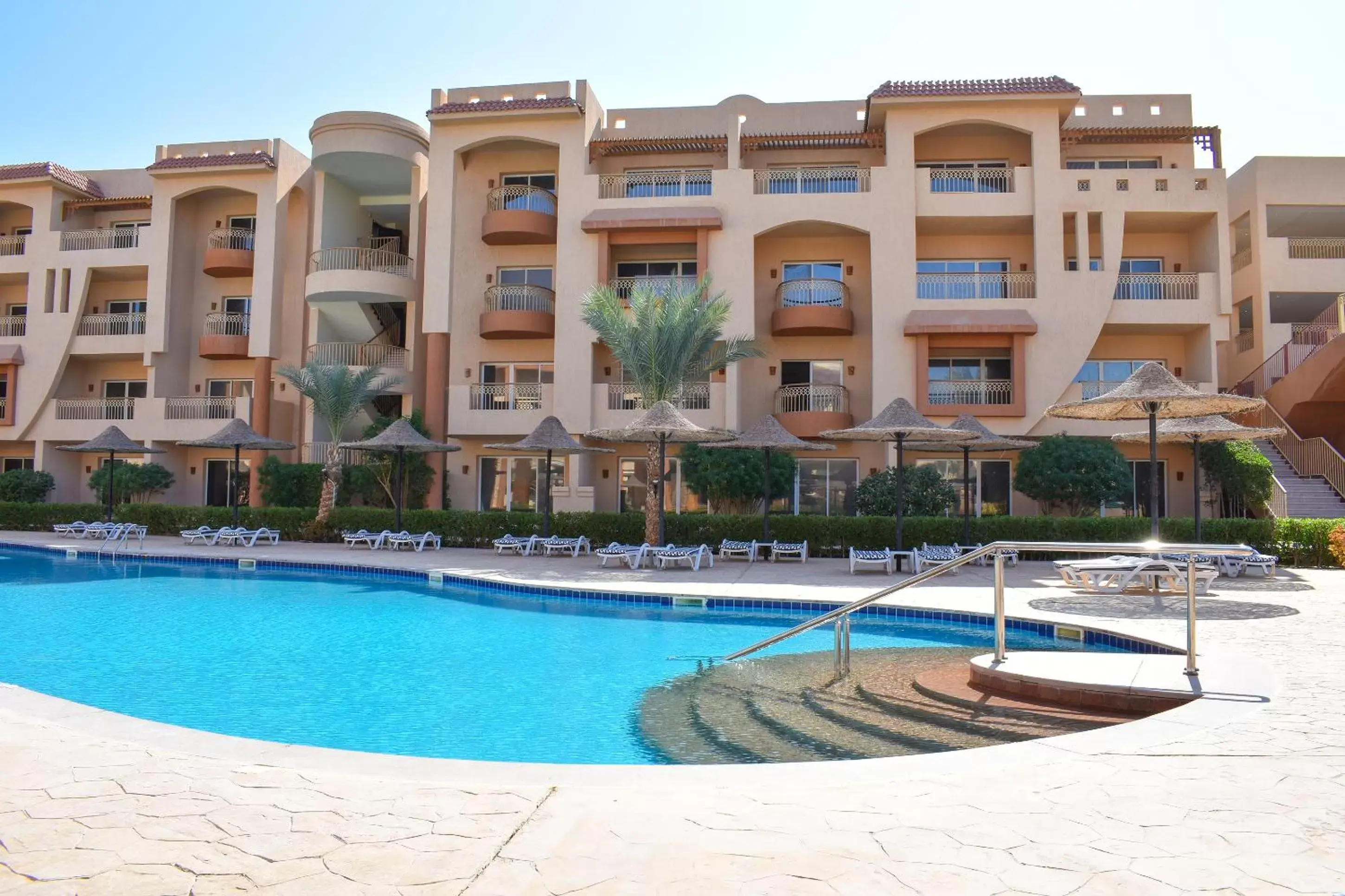 Swimming pool, Property Building in Parrotel Lagoon Waterpark Resort