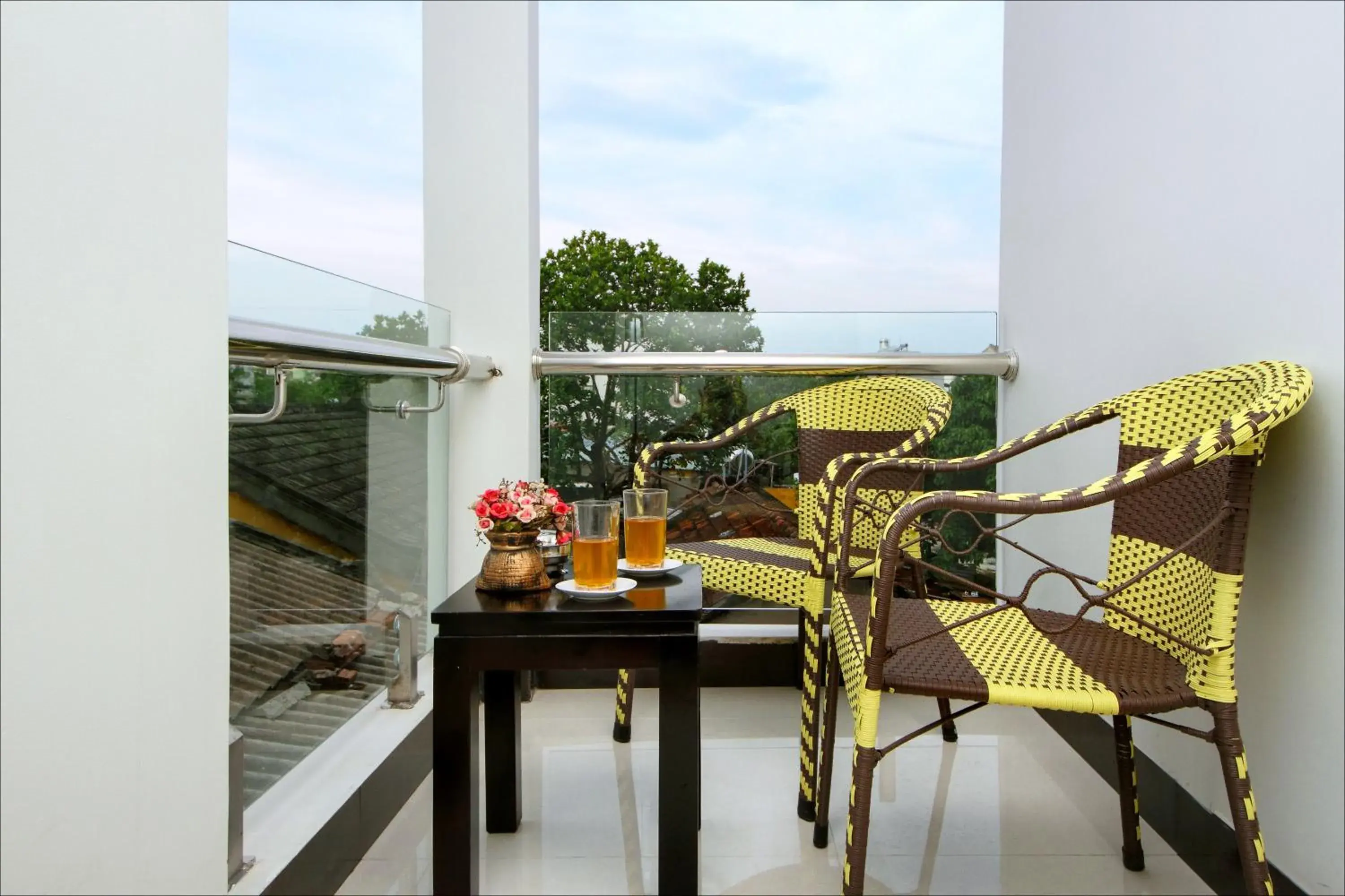 Property building, Patio/Outdoor Area in Flame Flowers Homestay