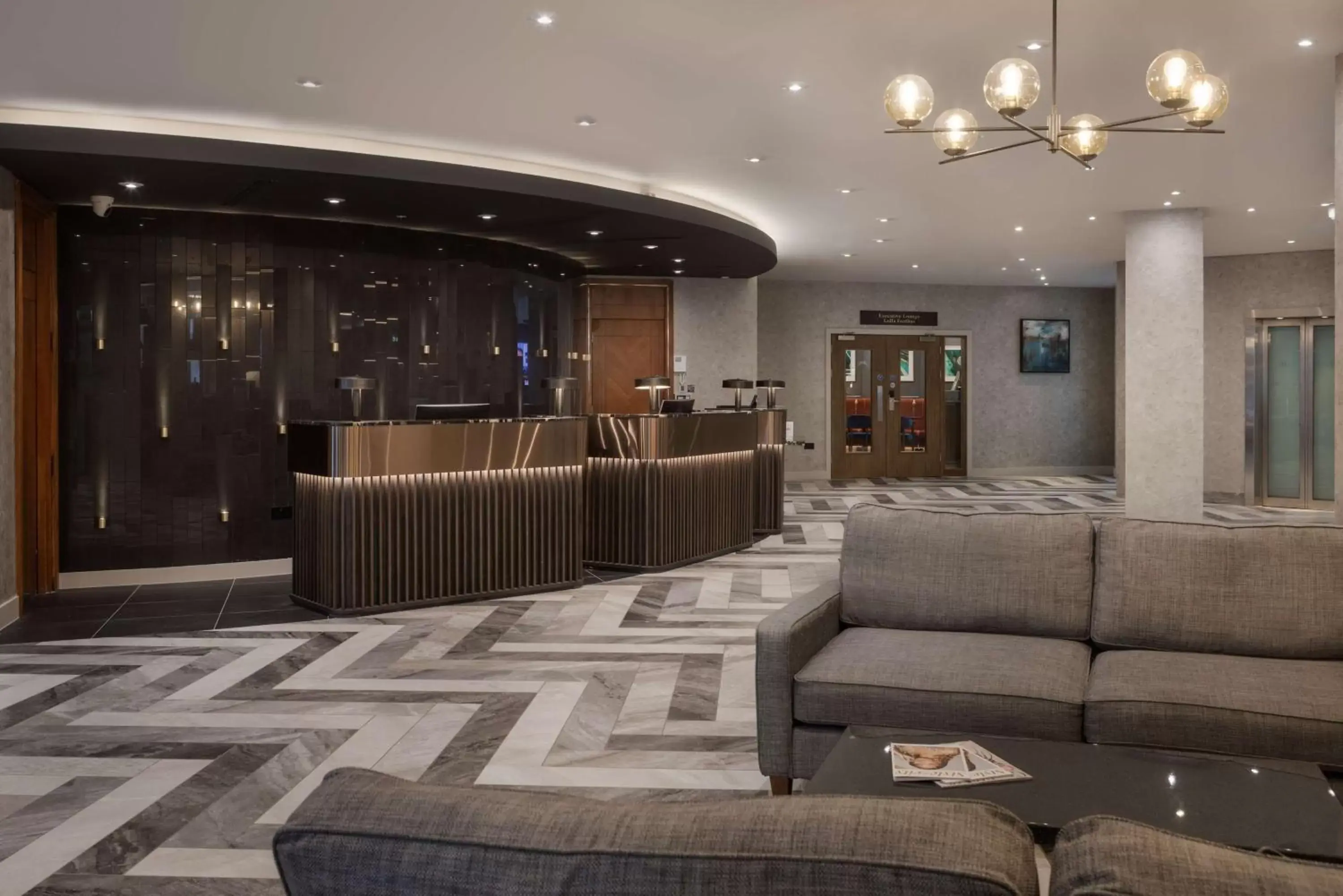 Lobby or reception in Hilton Cardiff Lobby or reception in Hilton Cardiff