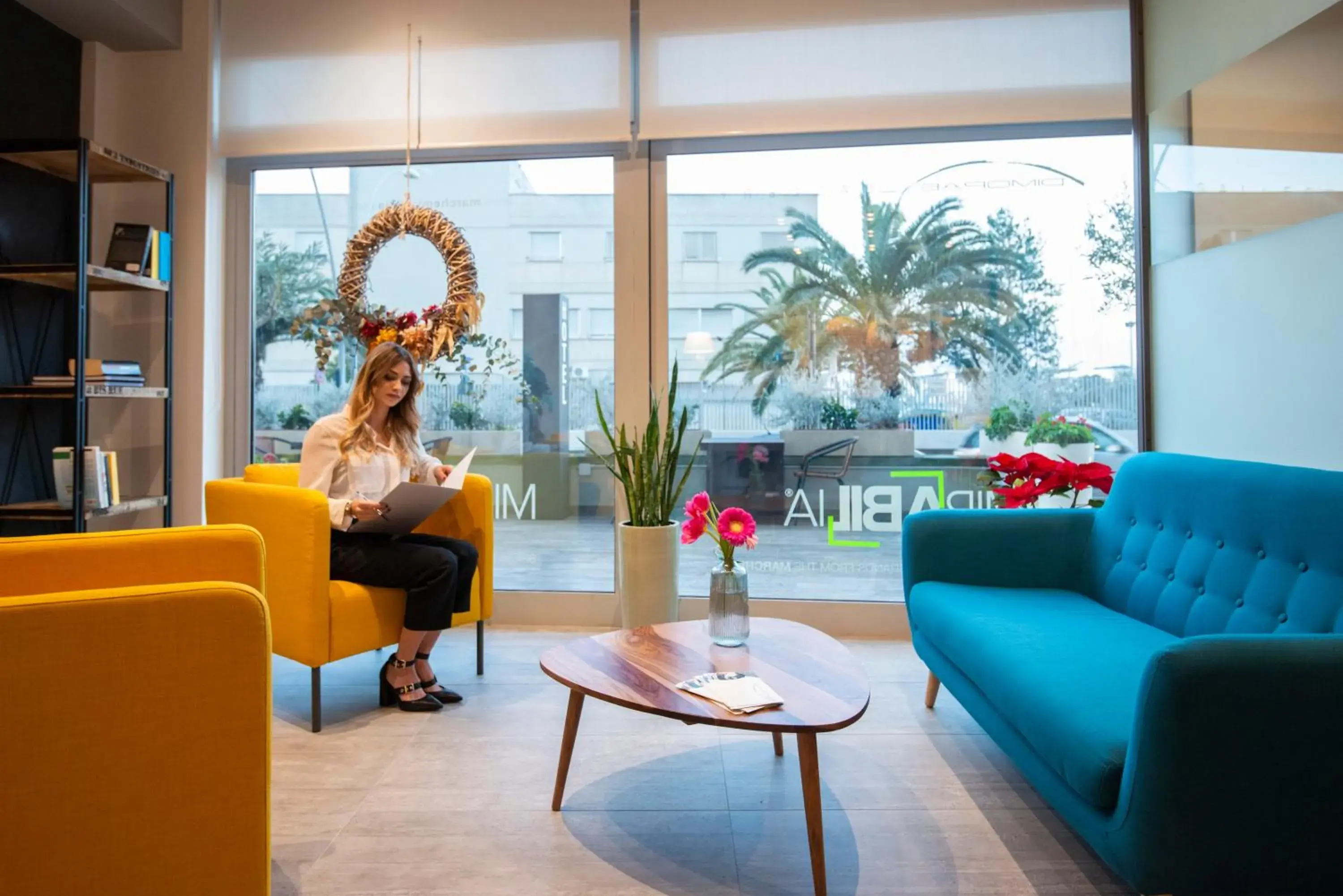 Communal lounge/ TV room in Hotel Dimorae