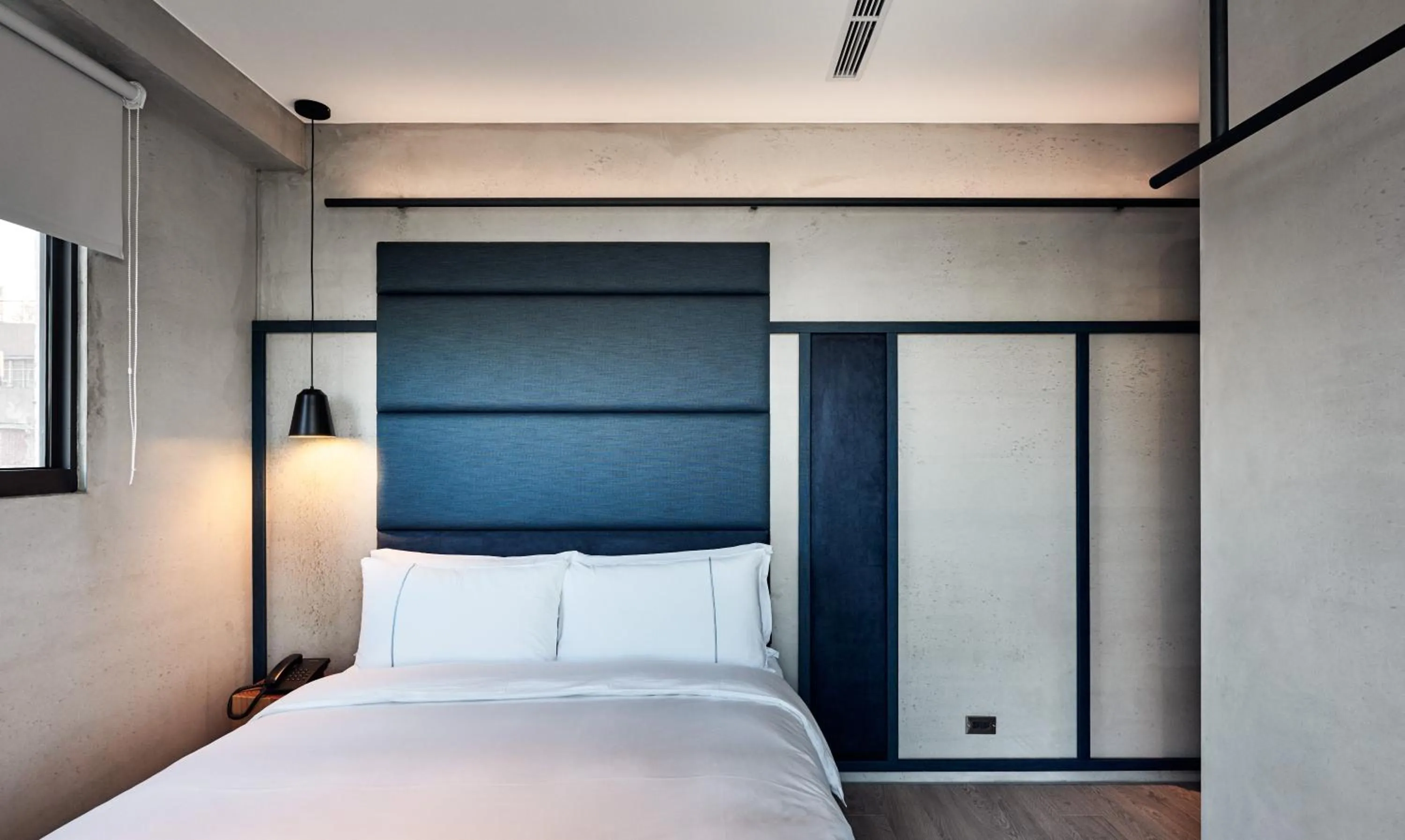 Bed in Waterfront Hotel