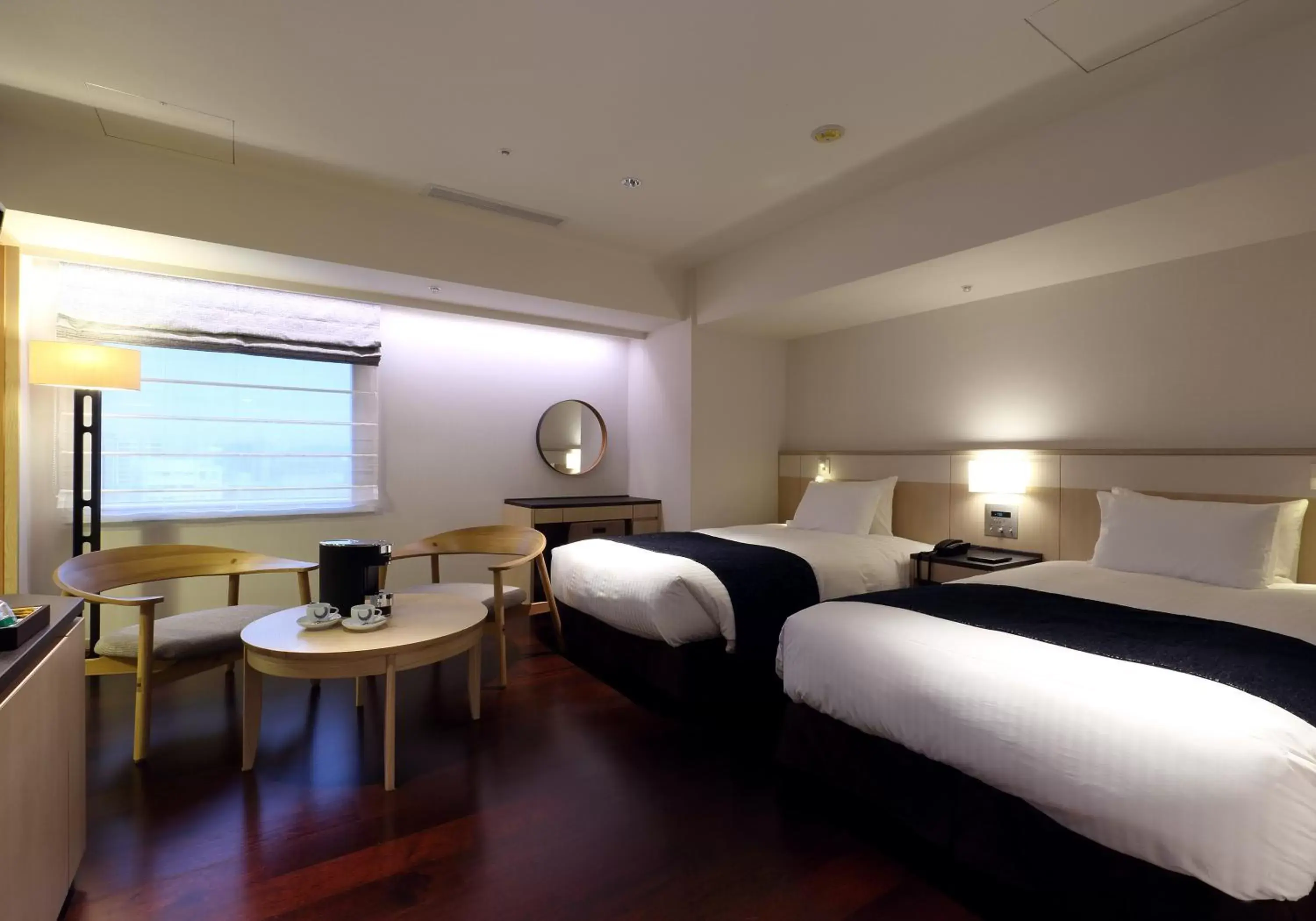 Photo of the whole room, Bed in Solaria Nishitetsu Hotel Fukuoka