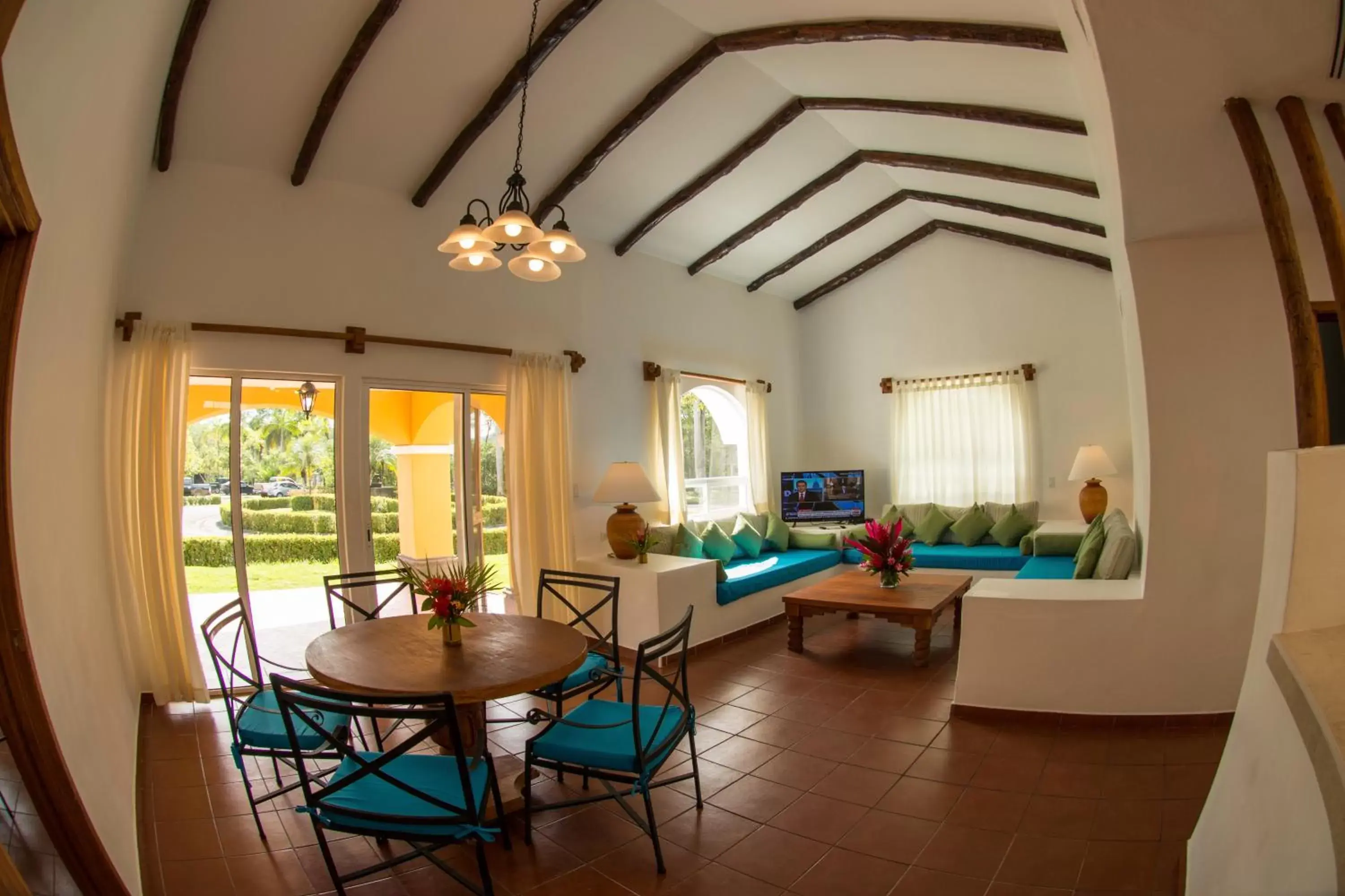 Living room, Dining Area in Amatique Bay Hotel