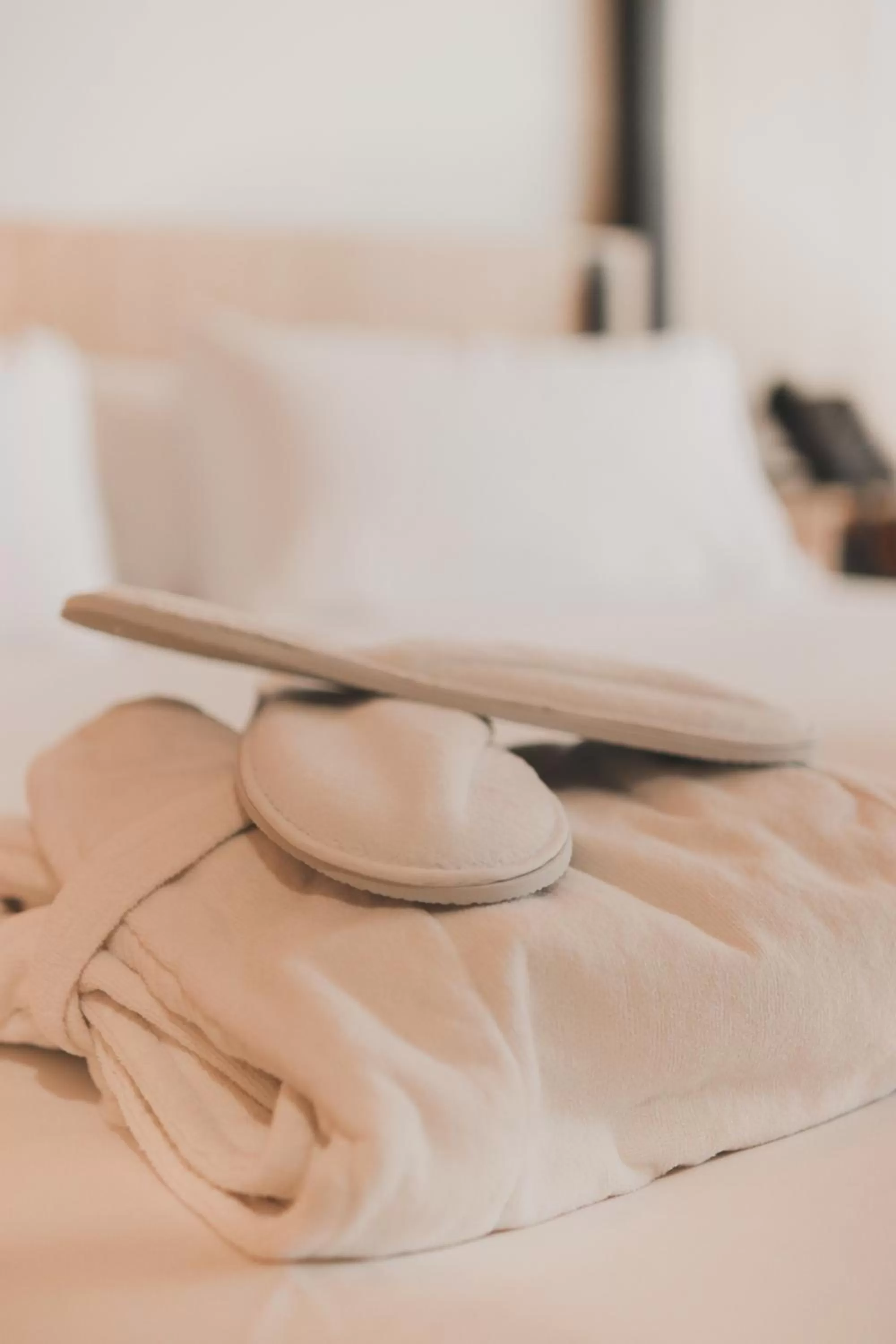 Bed in Atmos Hotel Boutique