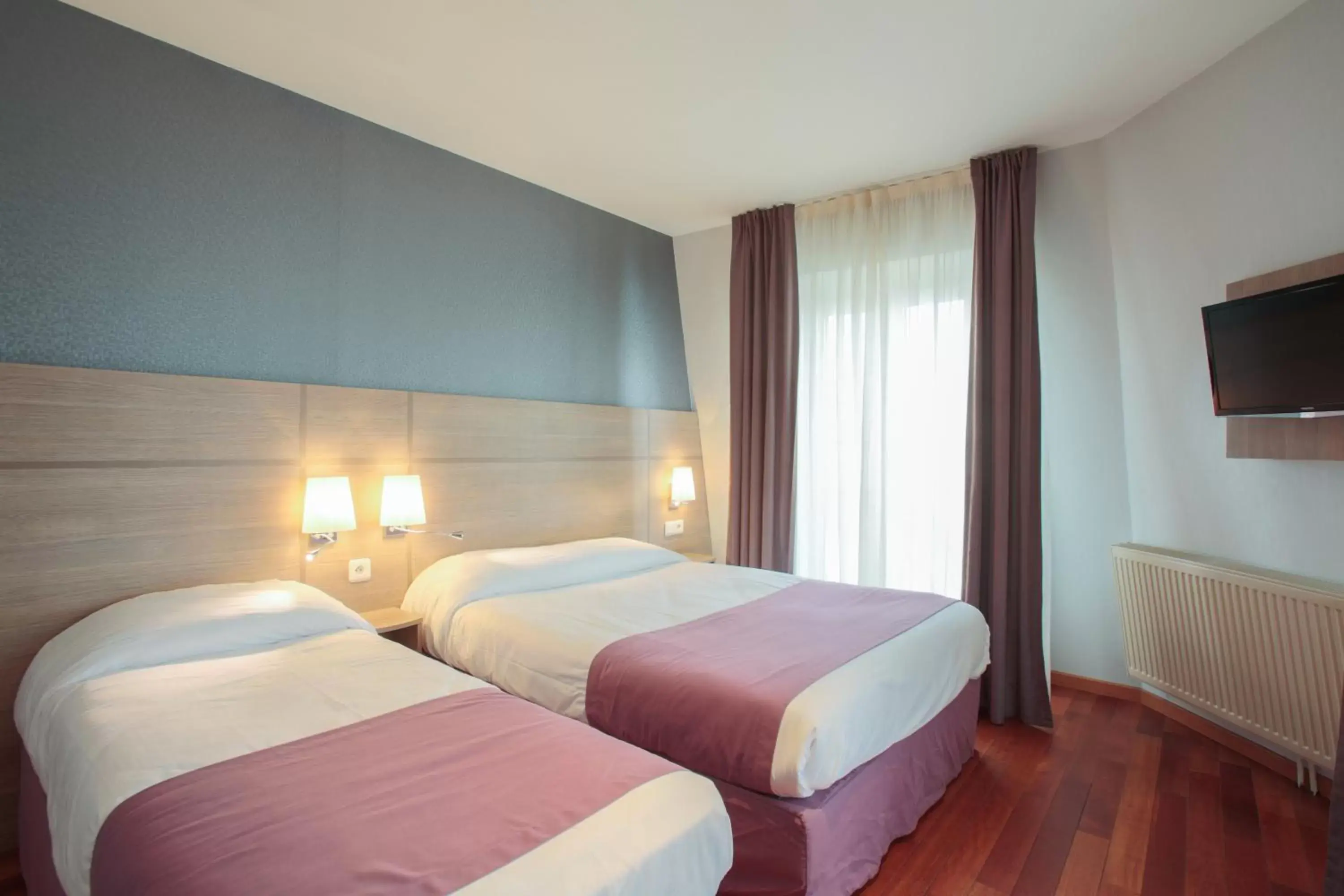 Bed in Grand Hotel du Loiret