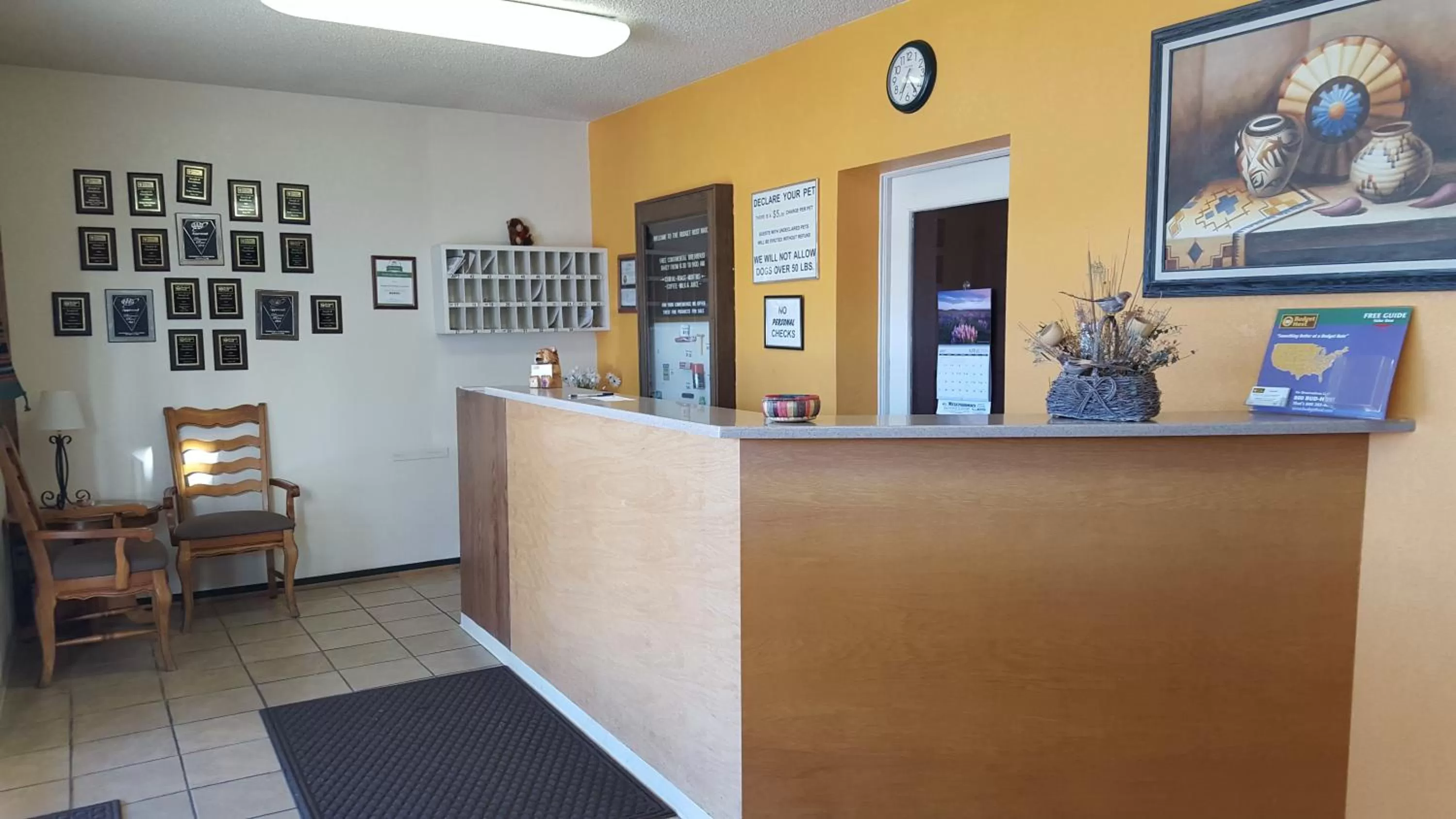 Property logo or sign in Budget Host Melody Lane