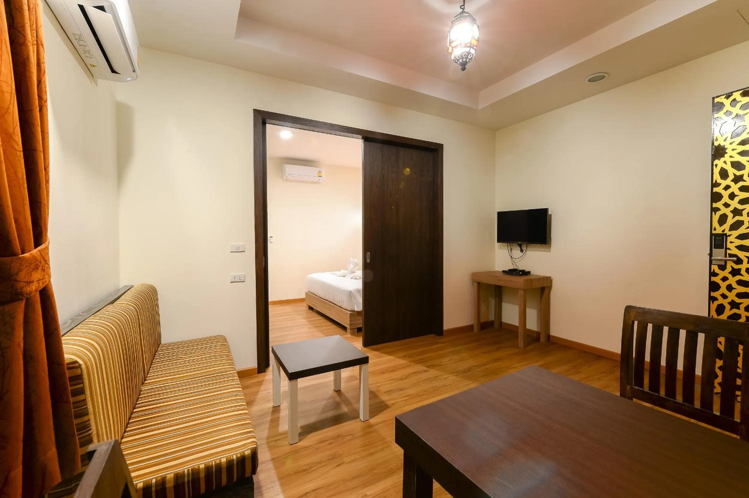 TV/Entertainment Center in Anchanlina Hotel - SHA Plus