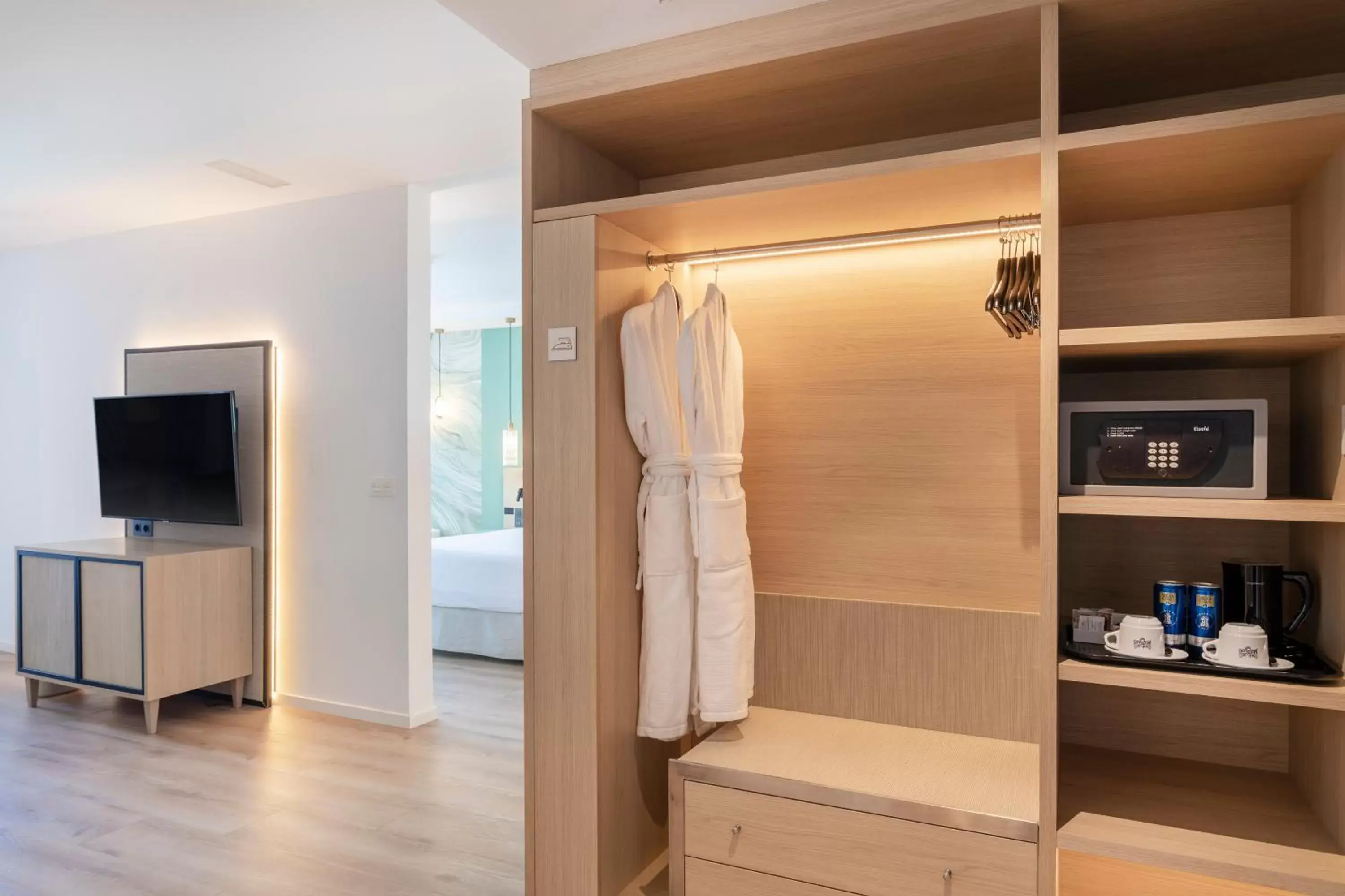 wardrobe, TV/Entertainment Center in Suites del Mar by Melia