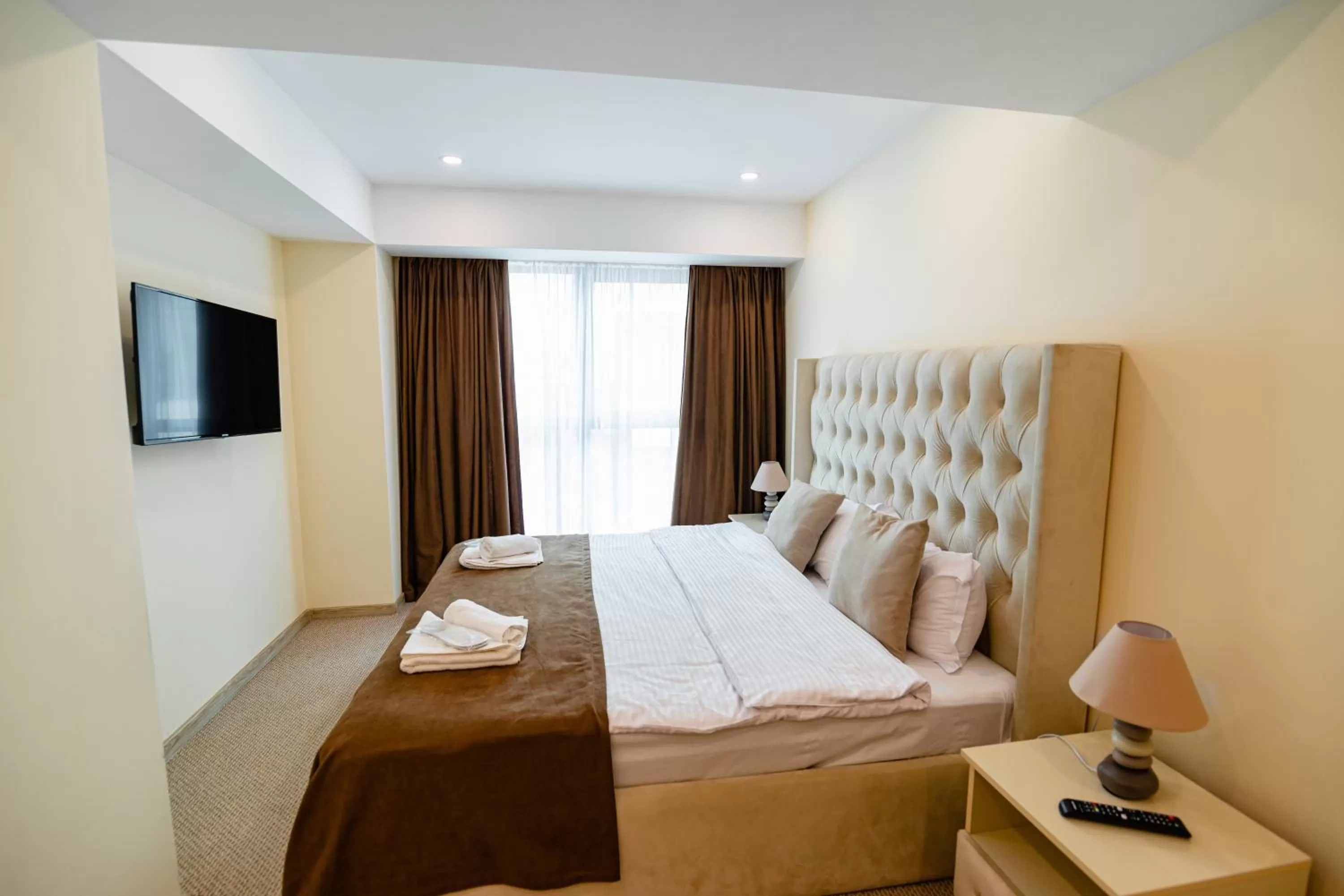 Bed in Royal Plaza Hotel