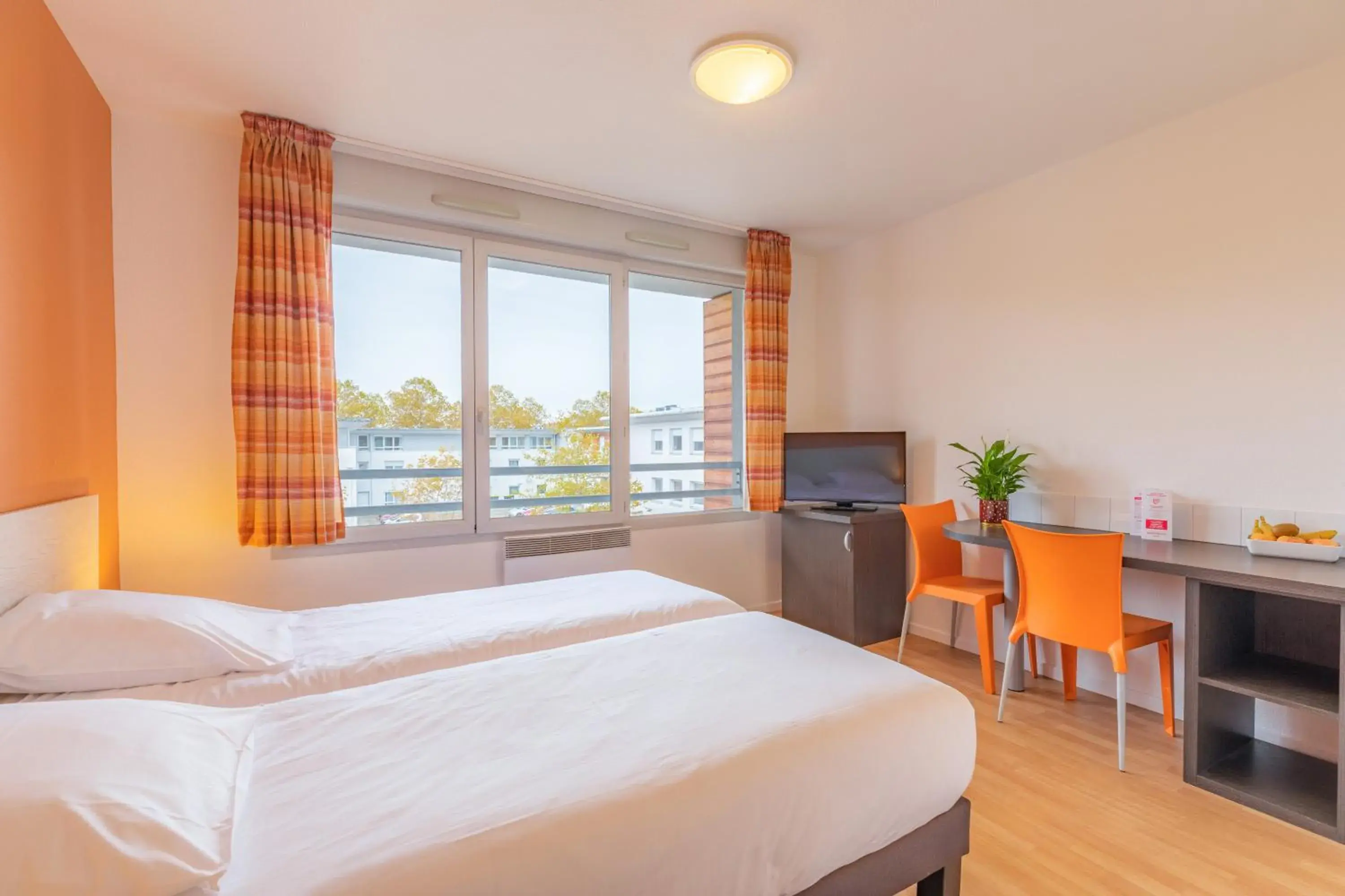 Bed in Appart'City Classic Bourg-en-Bresse Bed in Appart'City Classic Bourg-en-Bresse