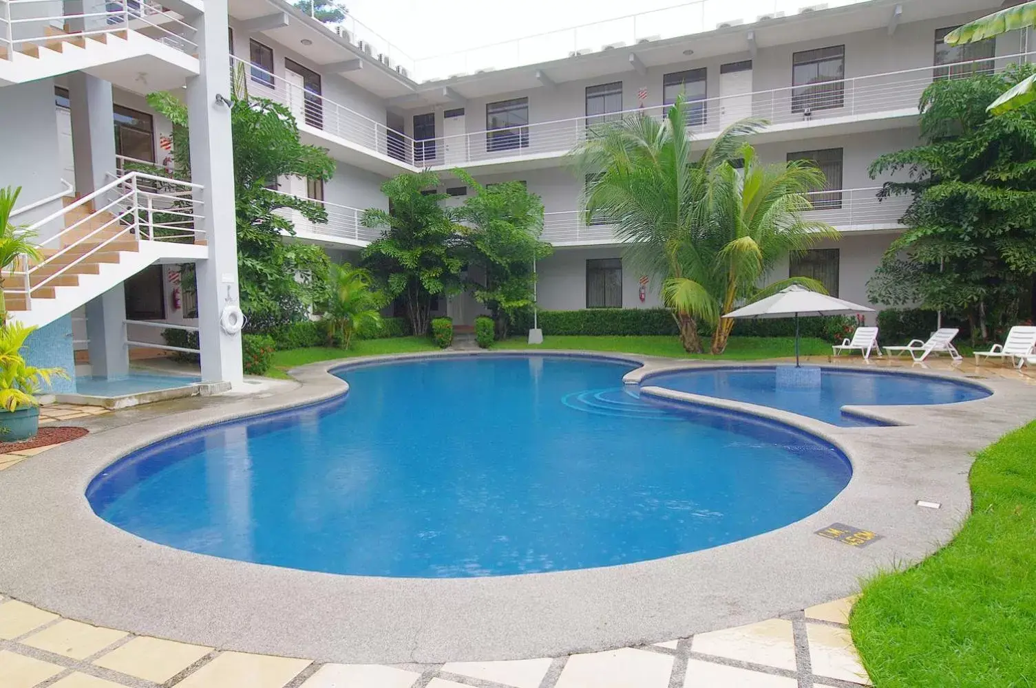 Property building, Swimming Pool in Hotel Punta Leona