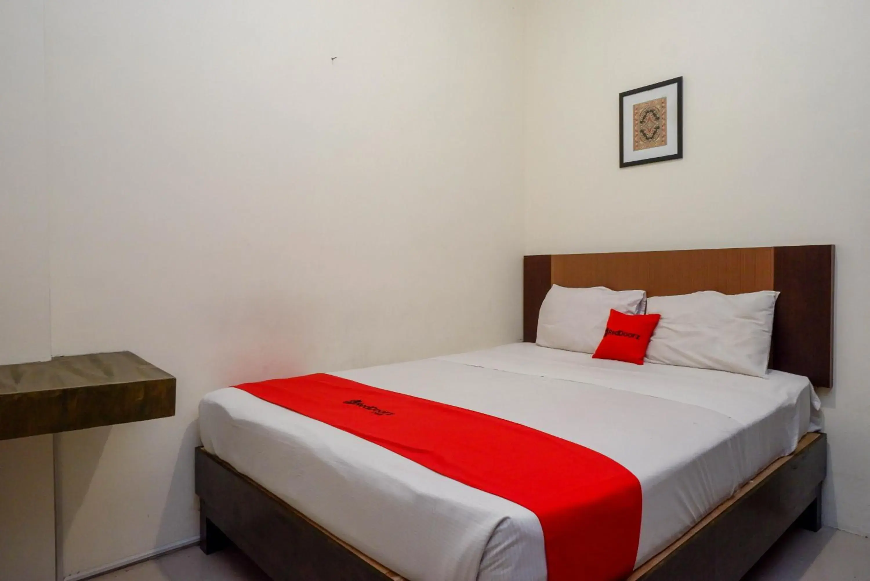 Bed in RedDoorz Syariah At Namira Hotel