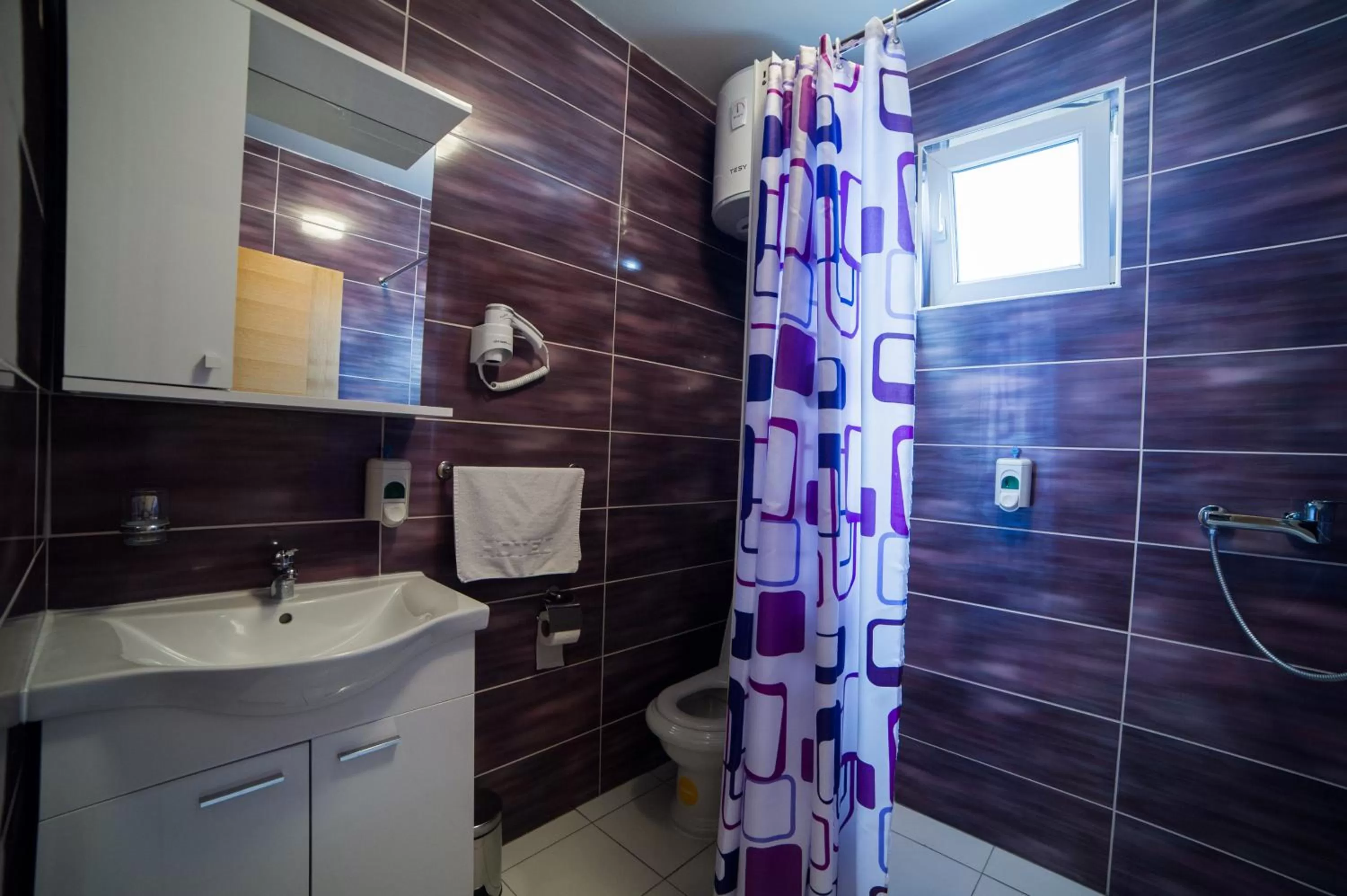 Bathroom in Motel Aura