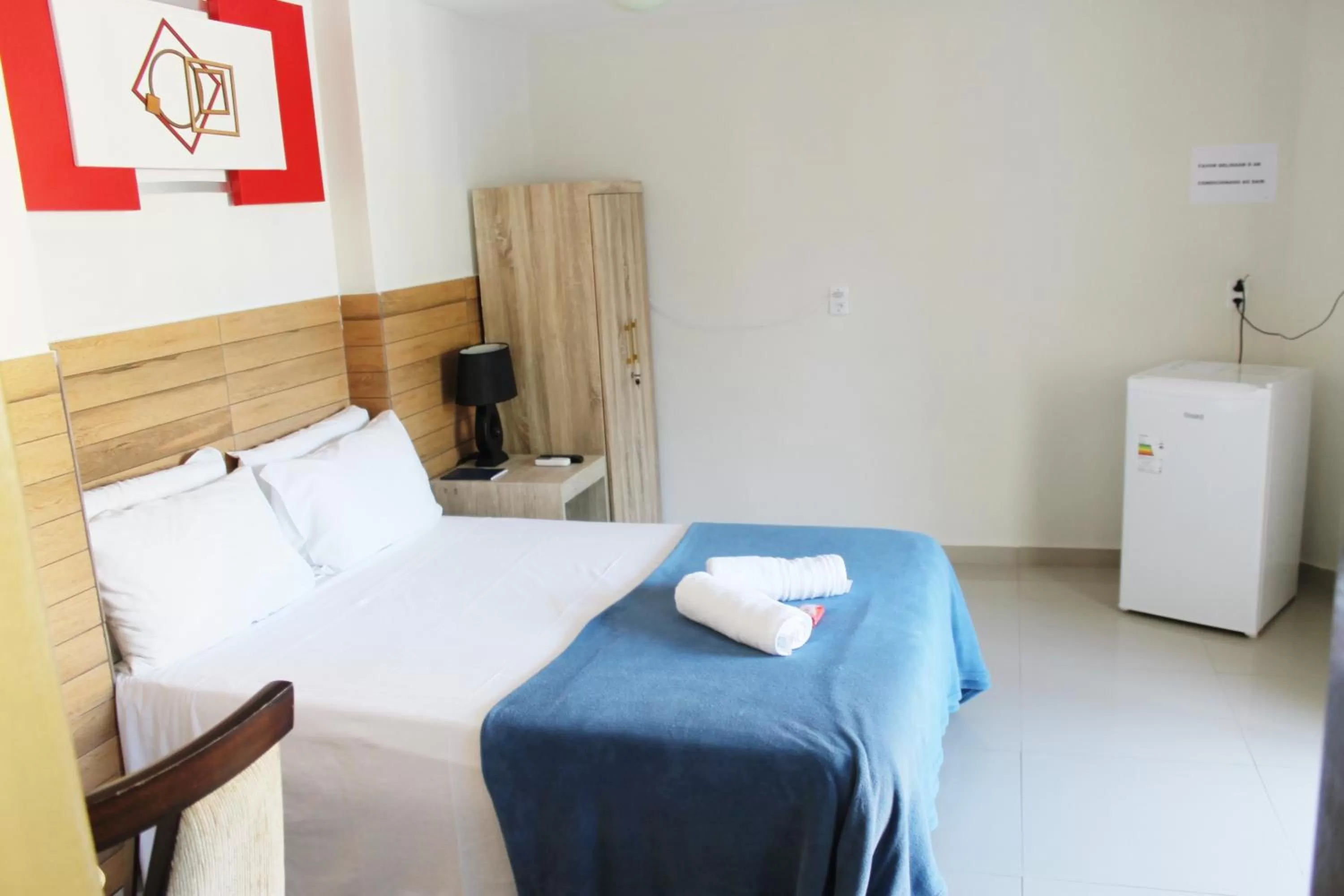 Bed in Pousada Das Palmeiras