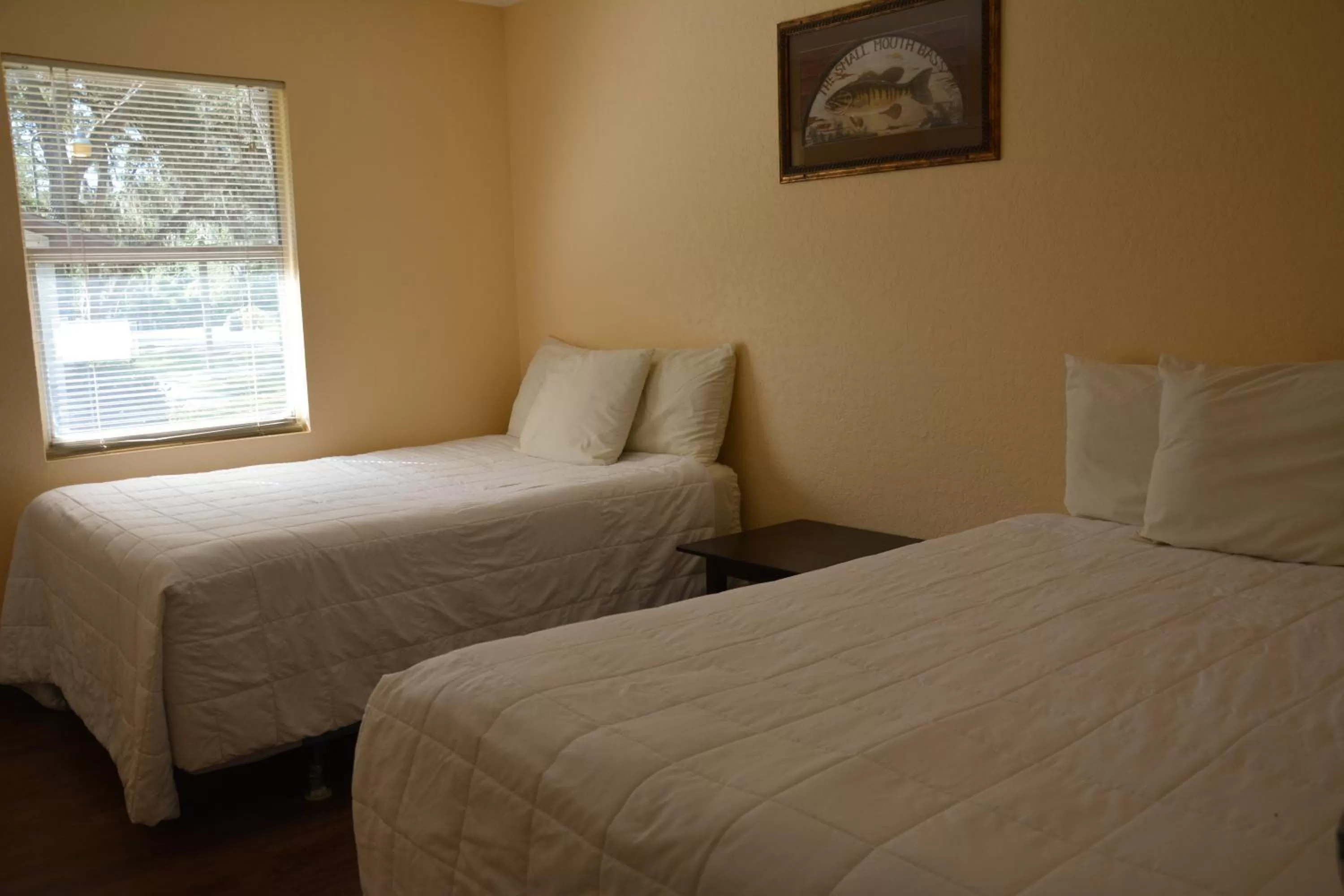 Bed in Camp Mack Lodge, Marina & RV Resort