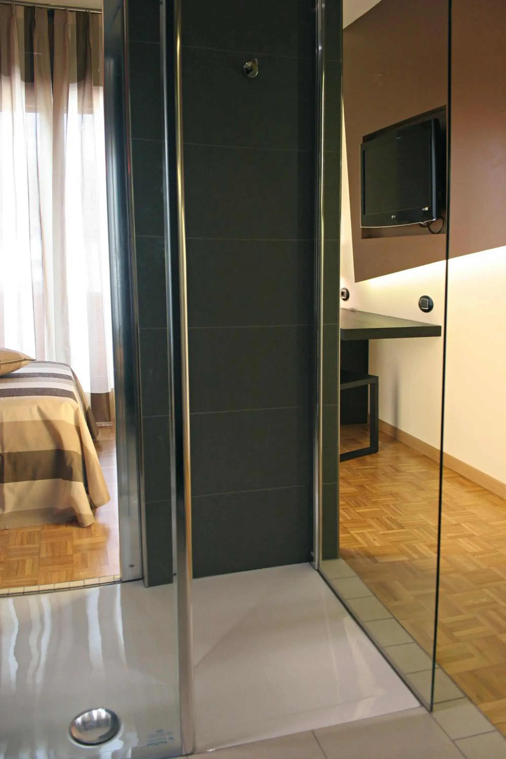 Bathroom, TV/Entertainment Center in Hotel La Pergola