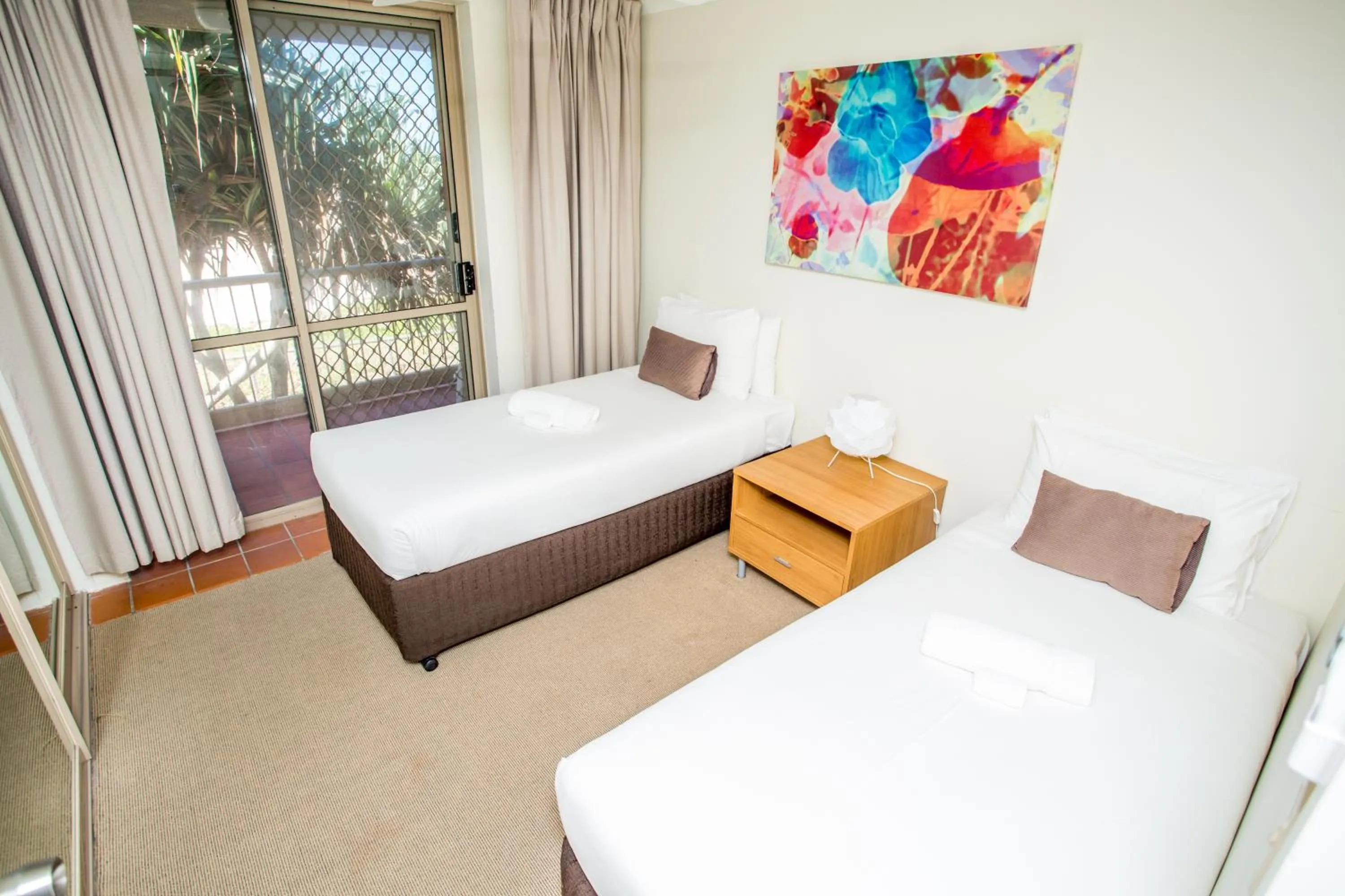 Bed in Sanctuary Beach Resort