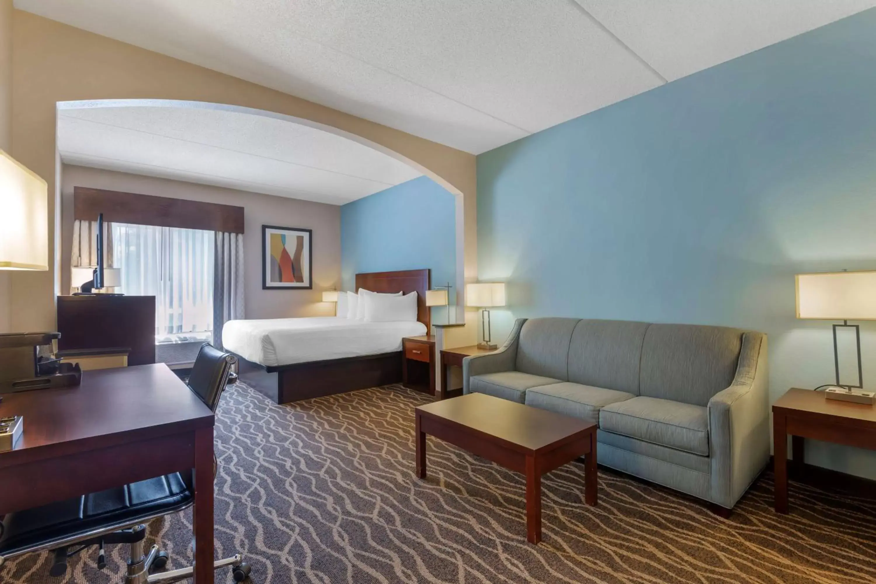 Bedroom, Seating Area in Best Western Plus Suites Greenville