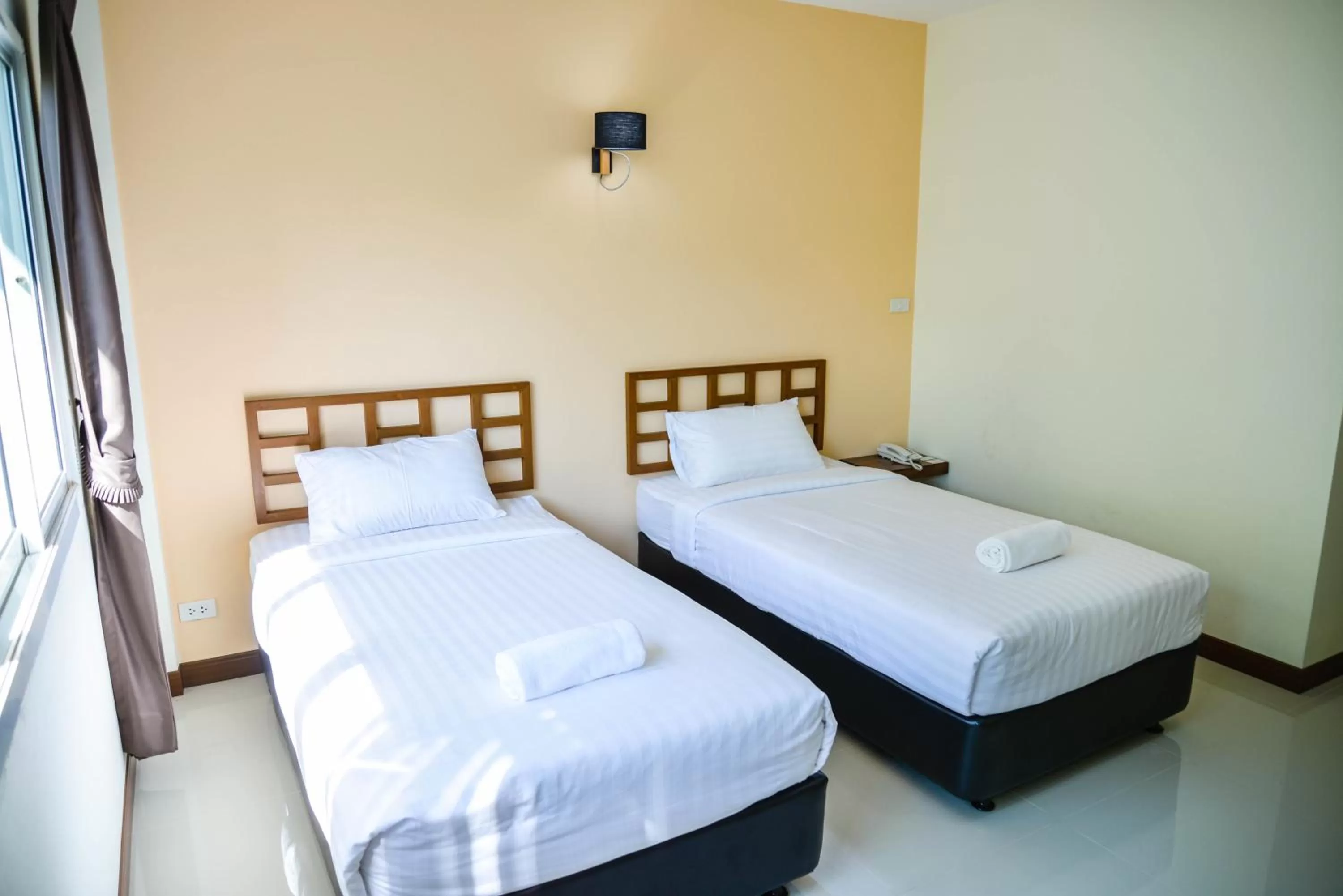 Bed in Thaimit Resort