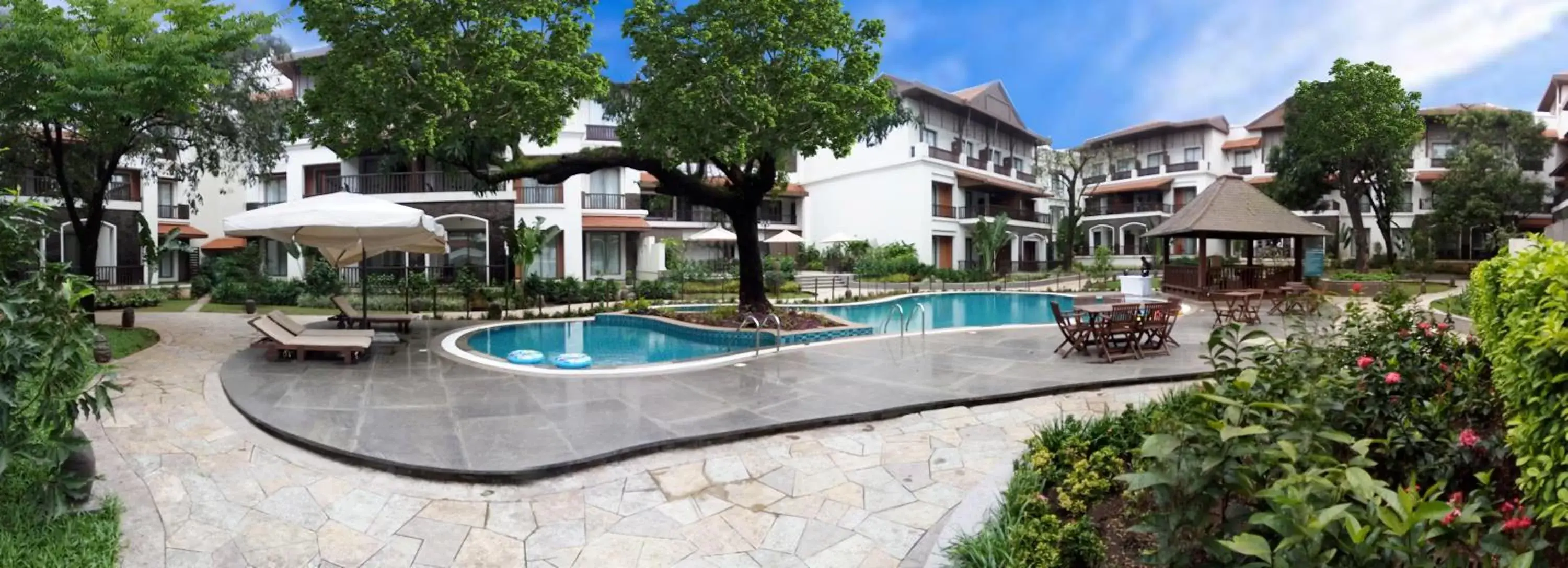 Swimming pool in Rhythm Lonavala - An All Suite Resort Swimming pool in Rhythm Lonavala - An All Suite Resort