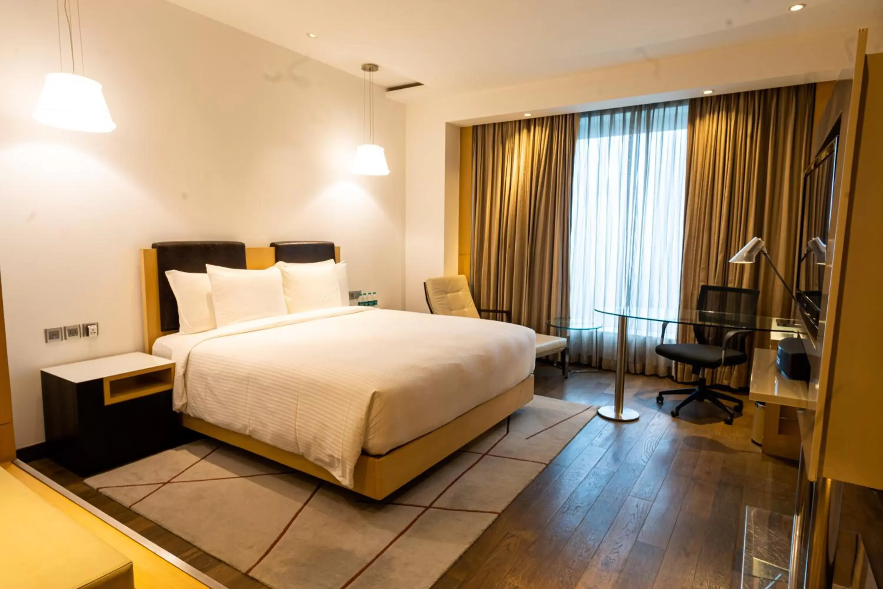 Bedroom, Bed in Crowne Plaza Greater Noida, an IHG Hotel